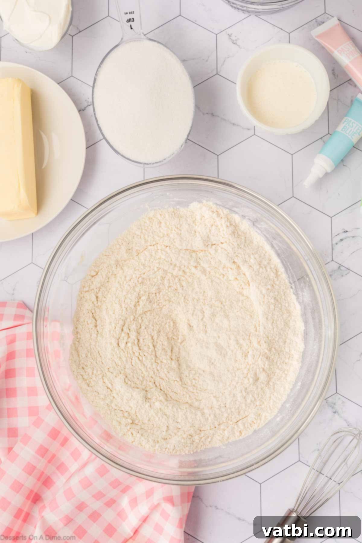 Soft Sour Cream Sugar Cookies 3 Dry ingredients combined in a bowl for sour cream sugar cookies.