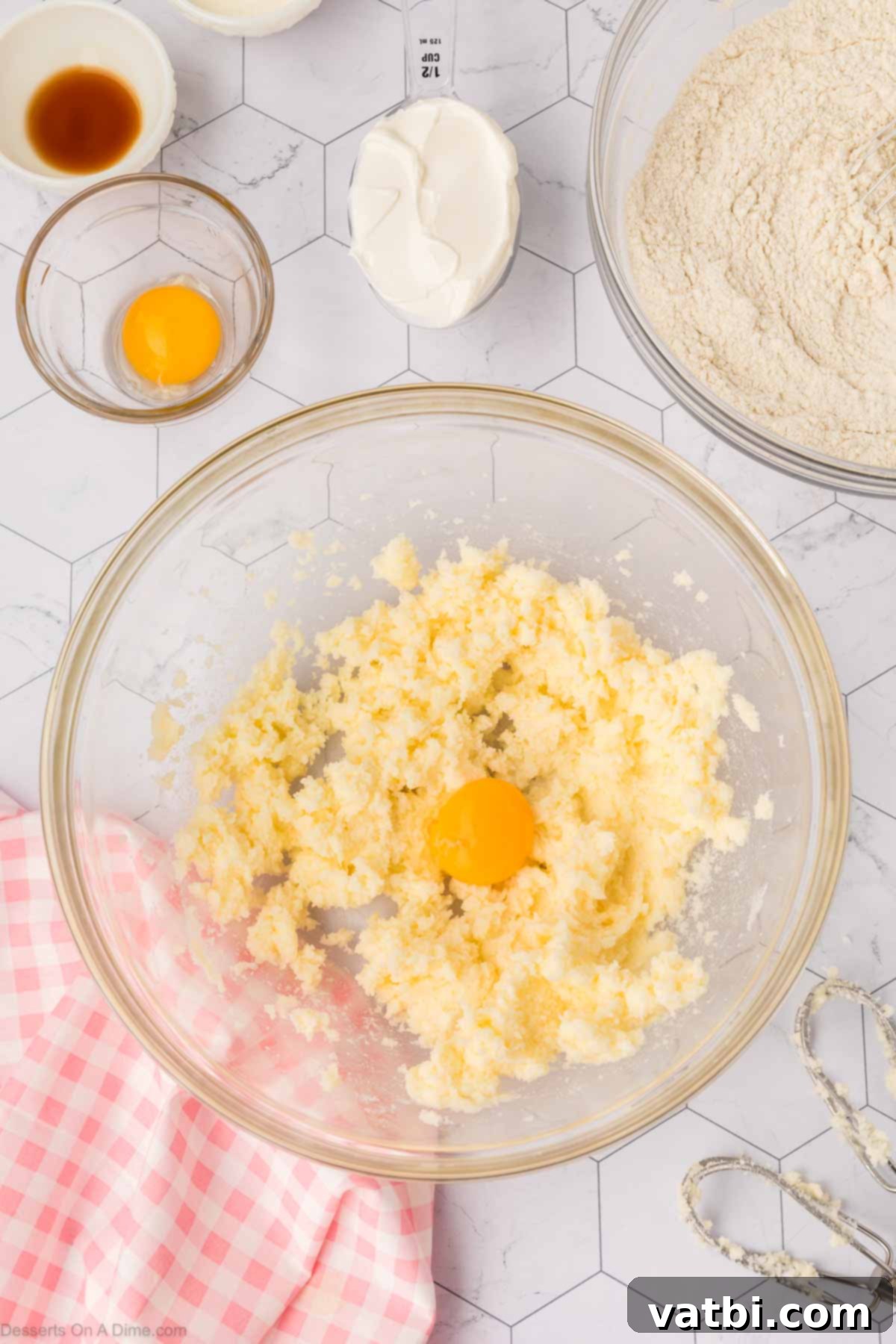 Soft Sour Cream Sugar Cookies 5 Eggs added to the creamed butter and sugar mixture.