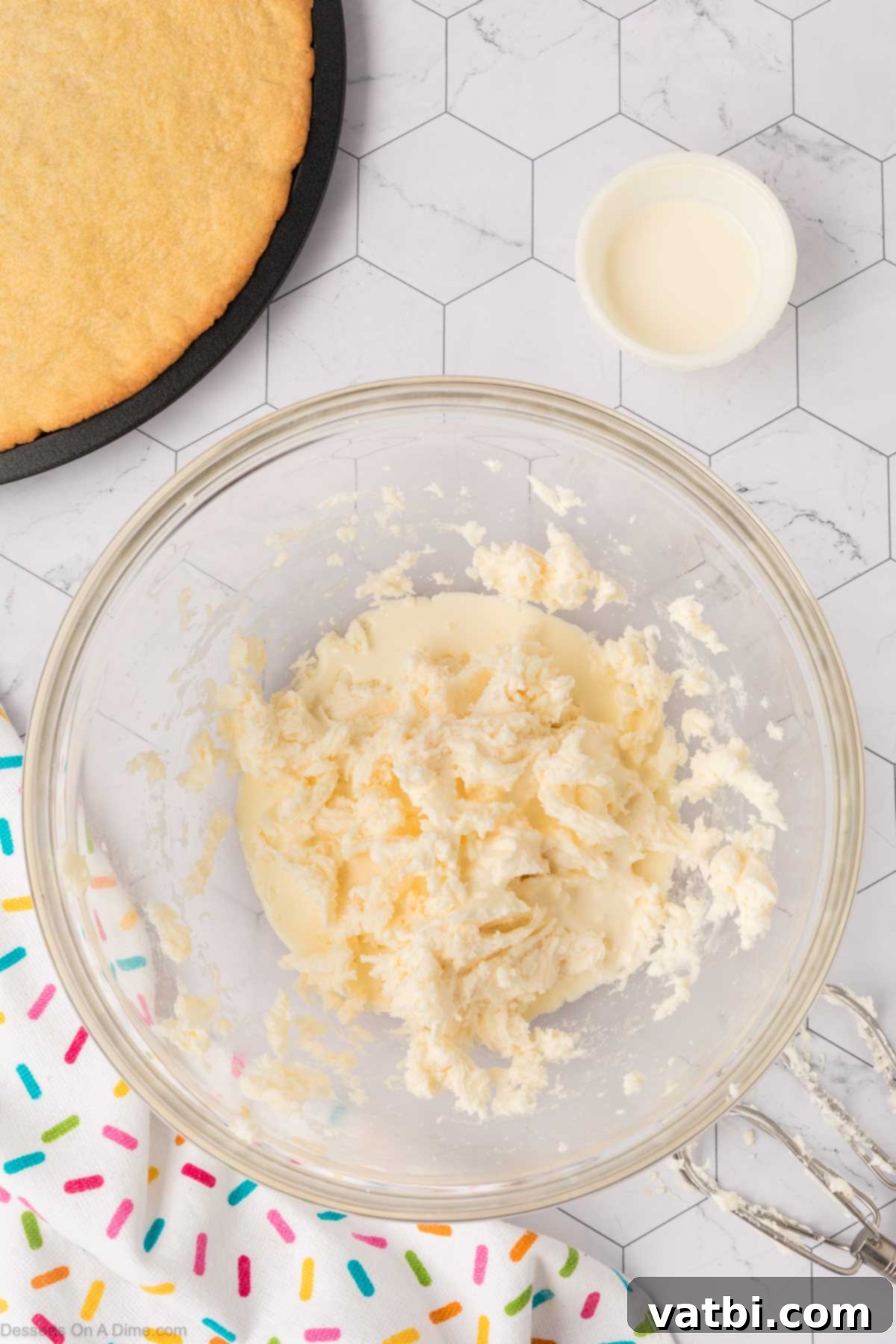 Perfect Sugar Cookie Cake 12 Vanilla combined into mixture.