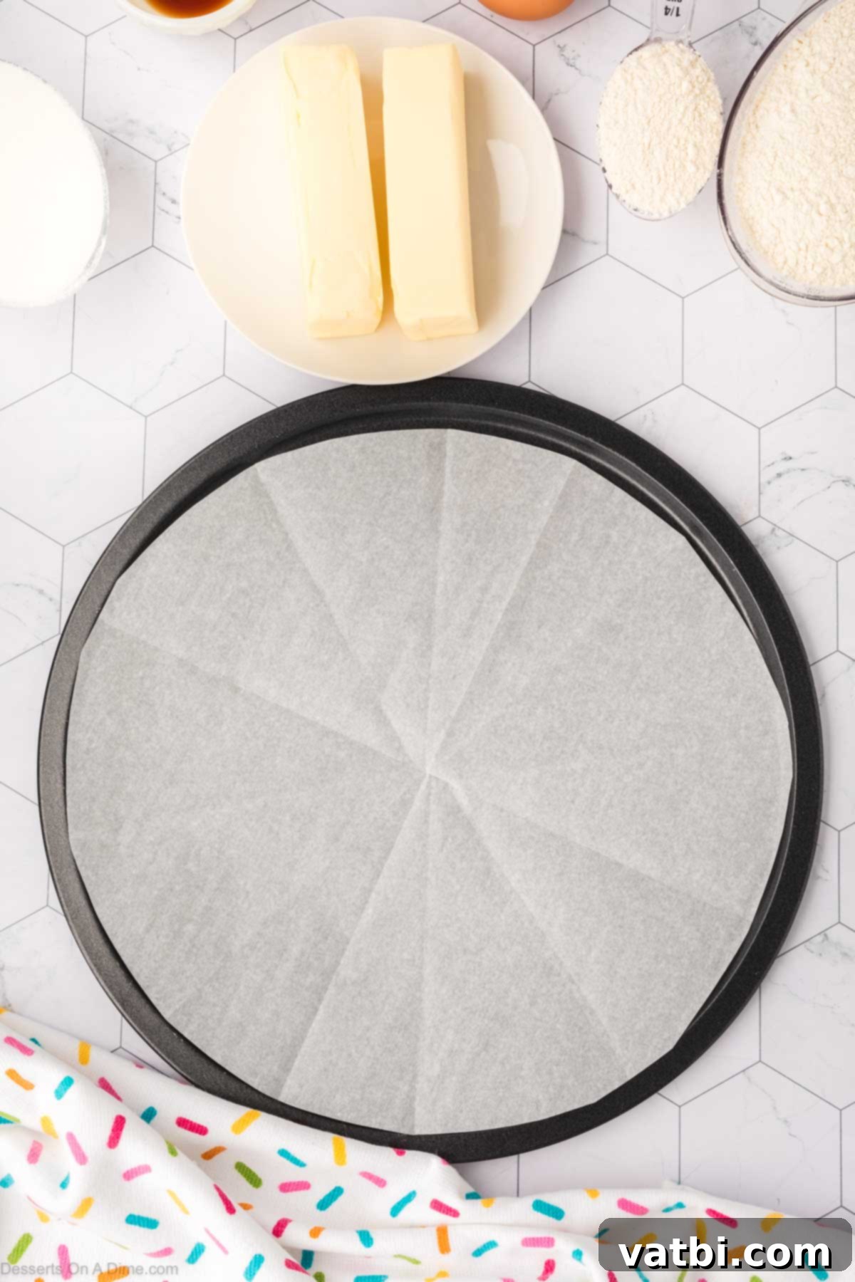 Perfect Sugar Cookie Cake 4 Cookie cake pan lined with parchment paper.