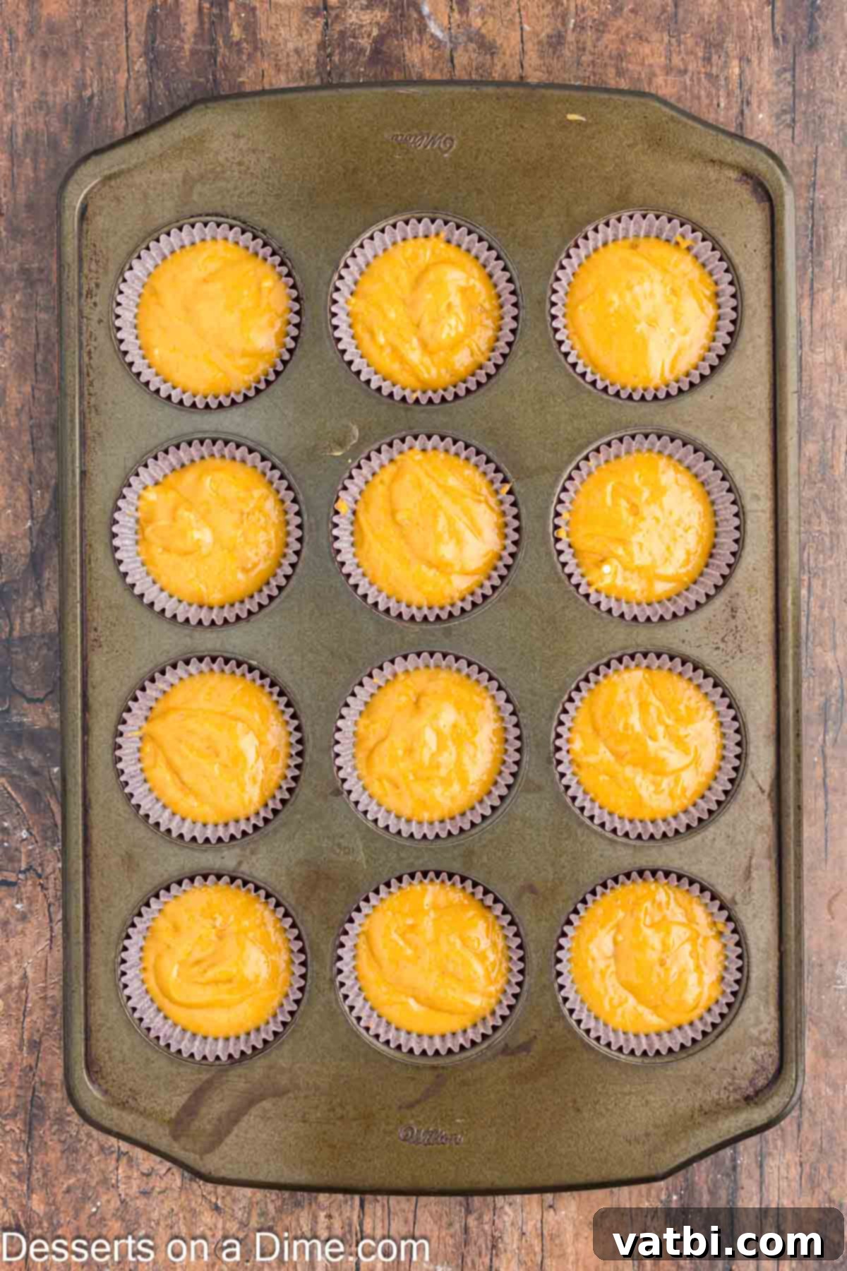 Magical Harry Potter Cupcakes 5 Cupcake batter poured evenly into muffin tins lined with cupcake wrappers.
