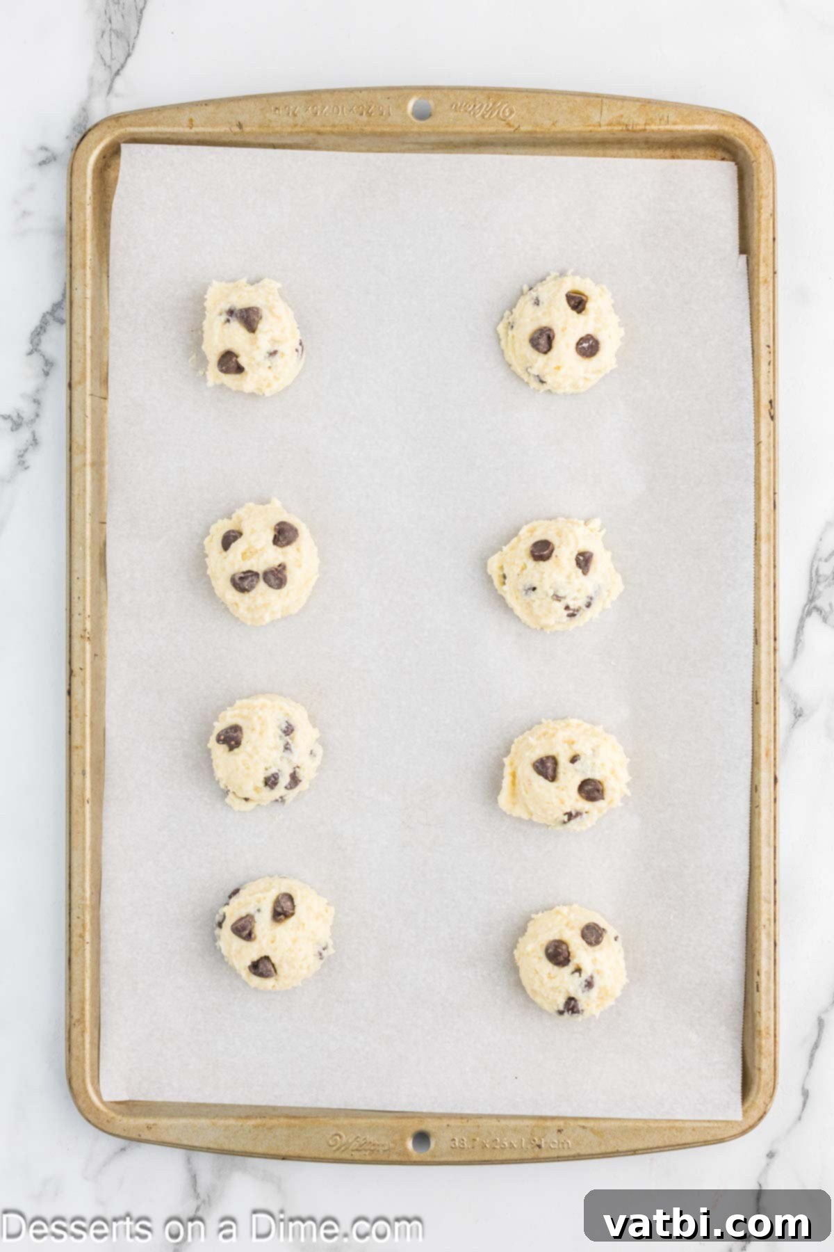 Wholesome Cottage Cheese Cookies 7 Scooped cookie dough balls placed evenly on a parchment-lined baking sheet, ready for baking.