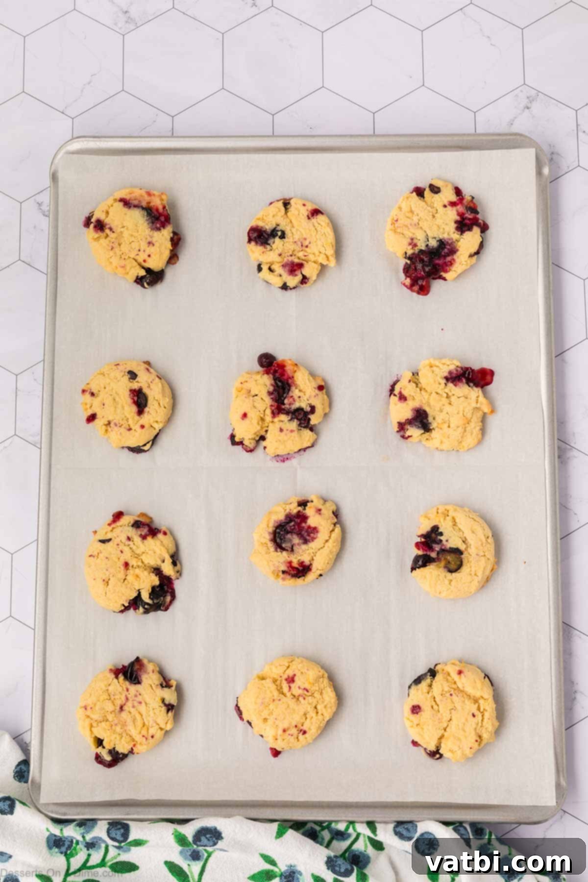 Delicious Blueberry Cookies 11 Cookies cooling on baking sheet.