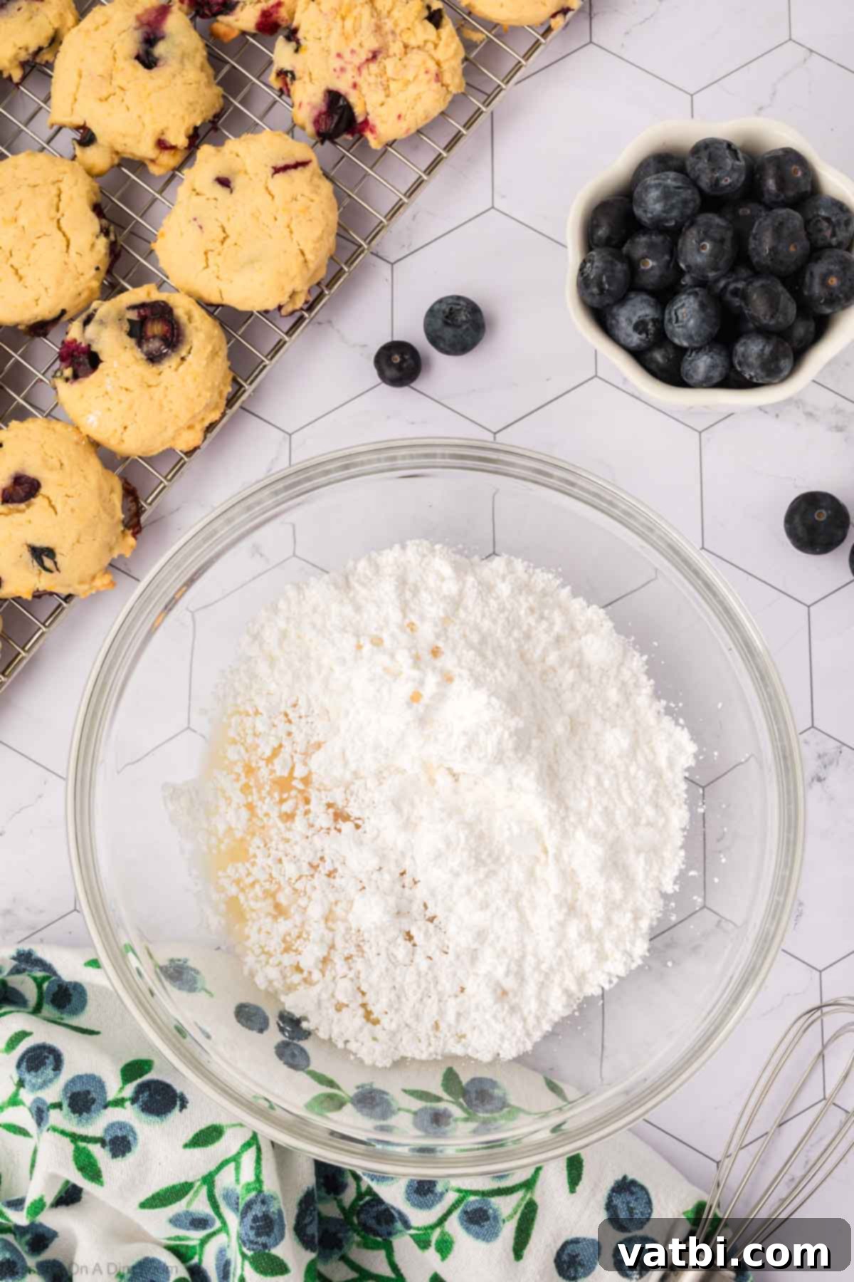 Delicious Blueberry Cookies 13 Glaze ingredients combined in a bowl.