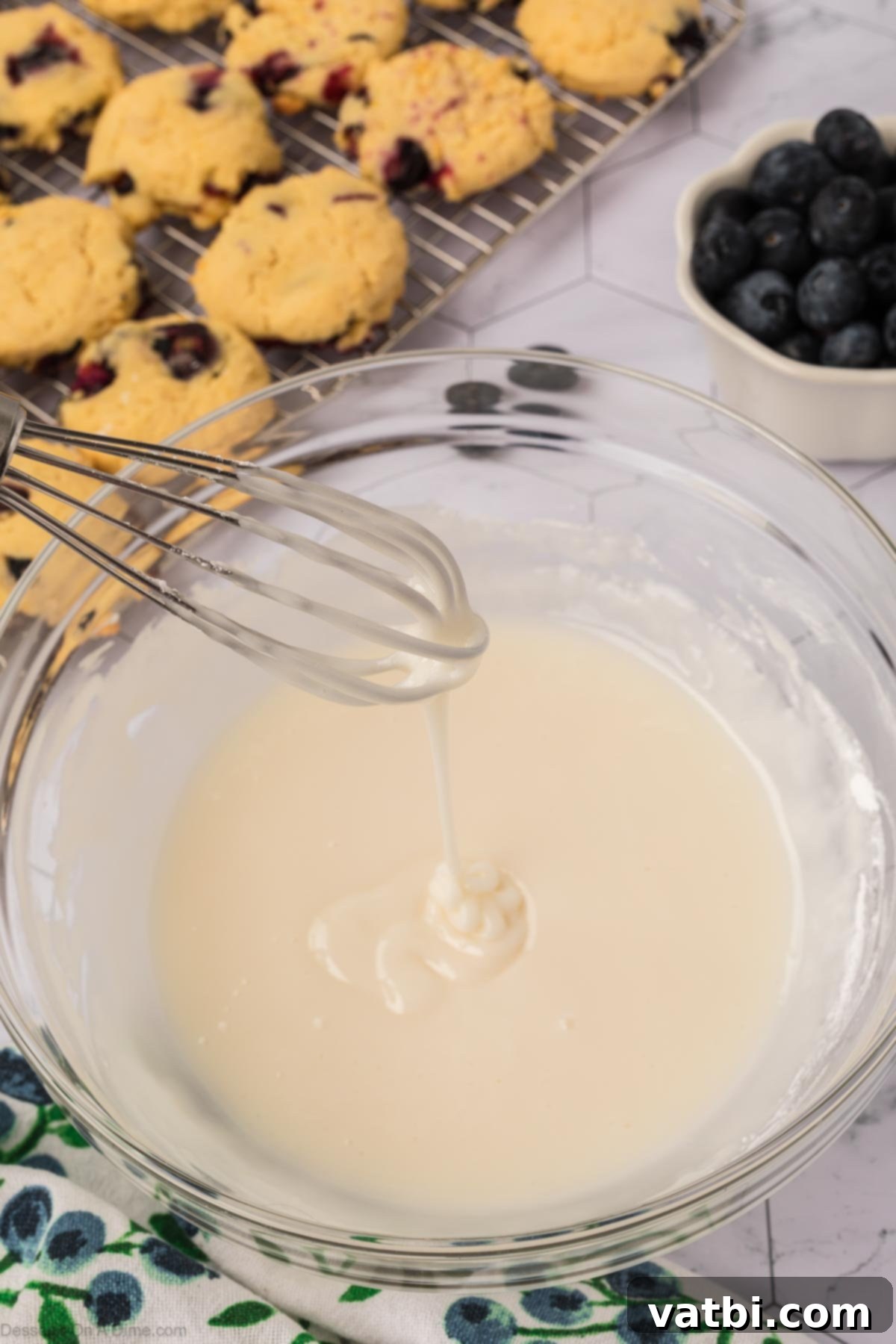 Delicious Blueberry Cookies 14 Glaze combined in a bowl.