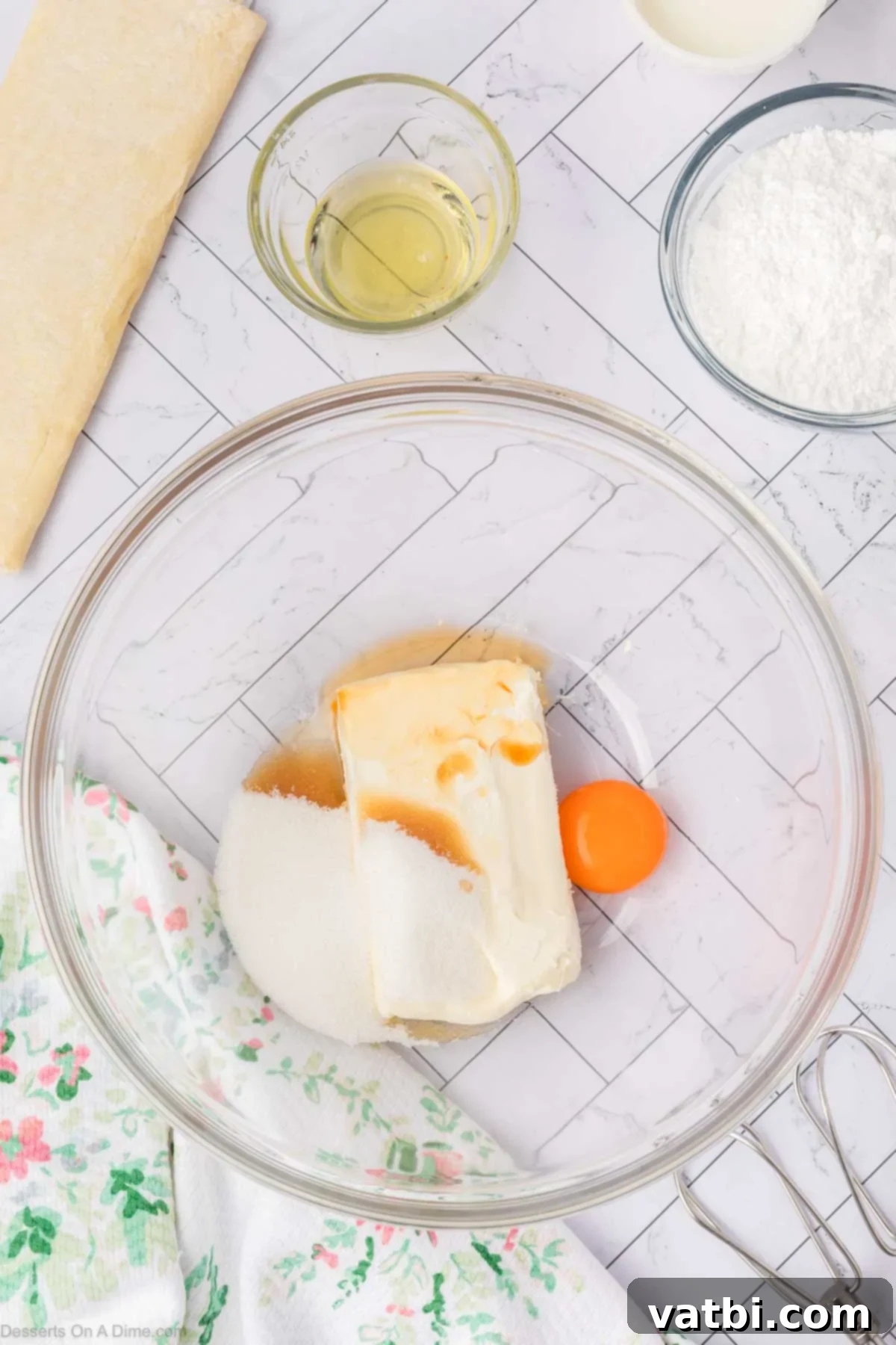 Heavenly Cream Cheese Danish 4 Cream cheese and egg in mixing bowl.