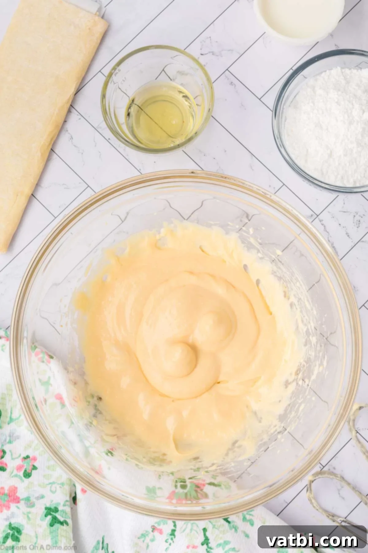 Heavenly Cream Cheese Danish 5 Cream cheese mixture combined in bowl.