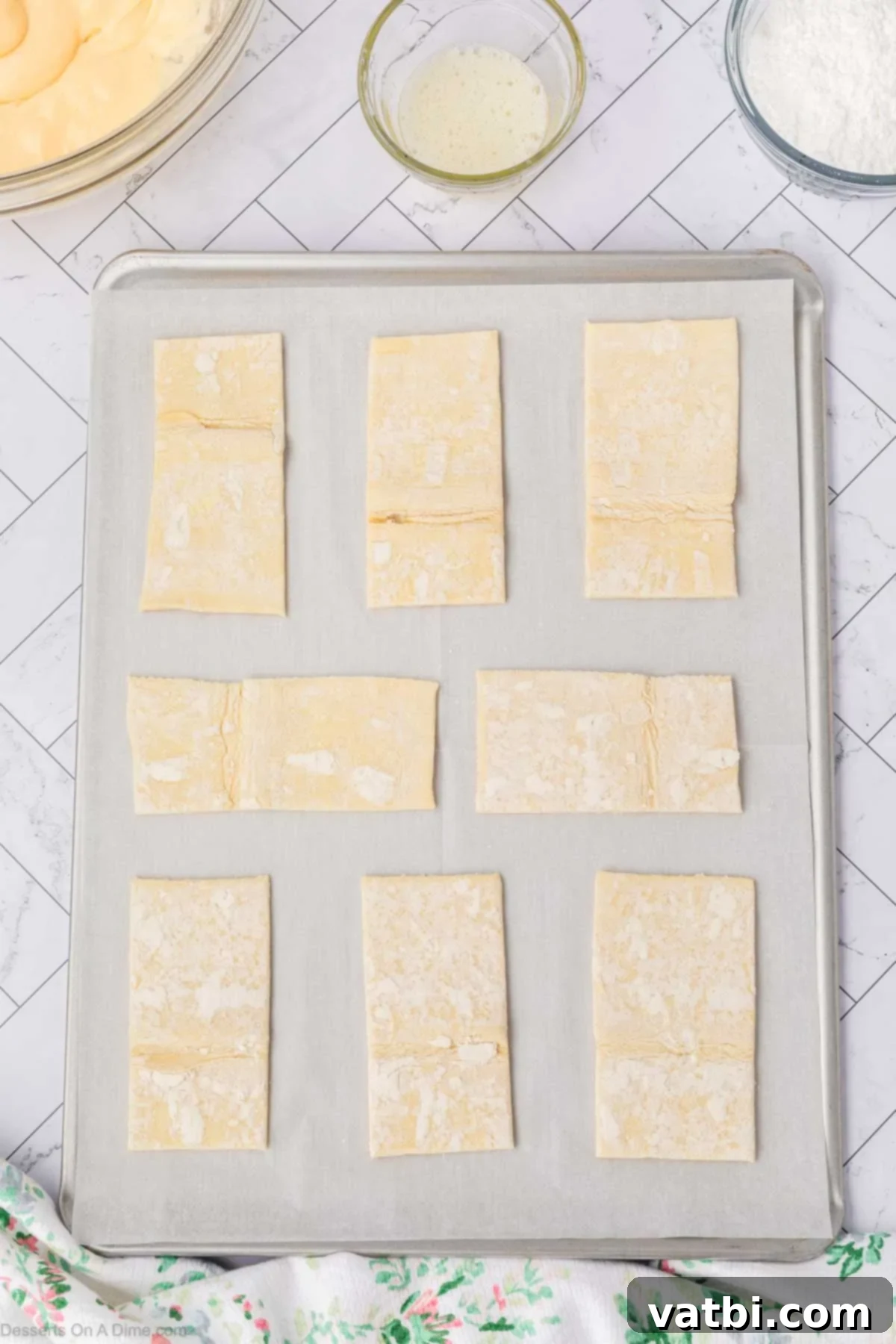 Heavenly Cream Cheese Danish 8 Pastry on baking sheet.