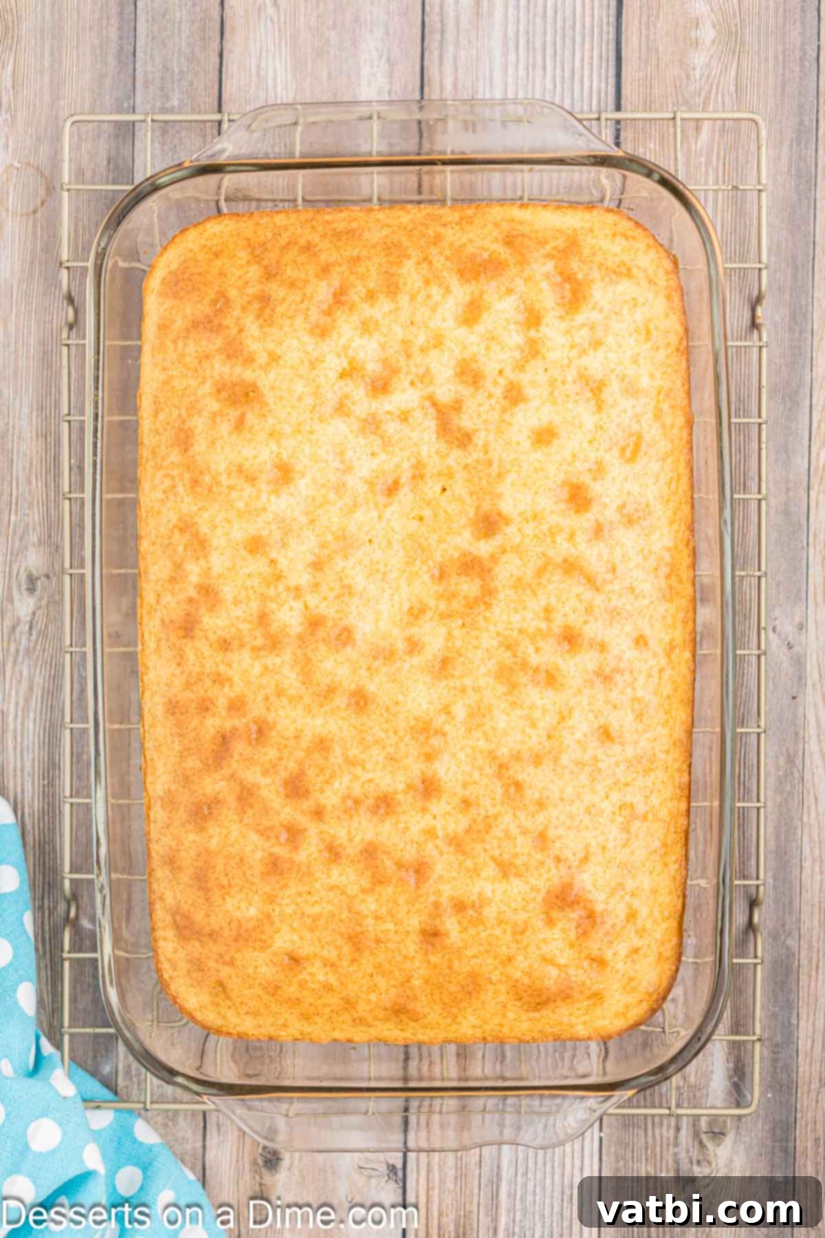 Orange Creamsicle Cake 6 Freshly baked cake cooling in the 9x13 inch pan.