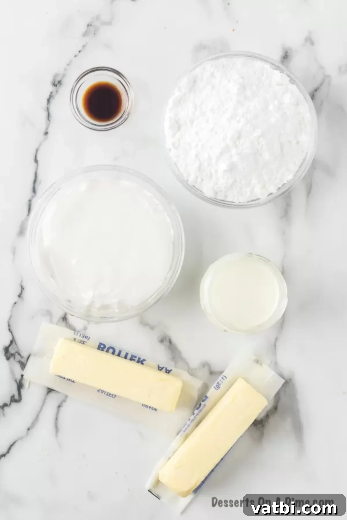Homemade Marshmallow Frosting Ingredients: room temperature butter, marshmallow fluff, sifted powdered sugar, pure vanilla extract, and milk.