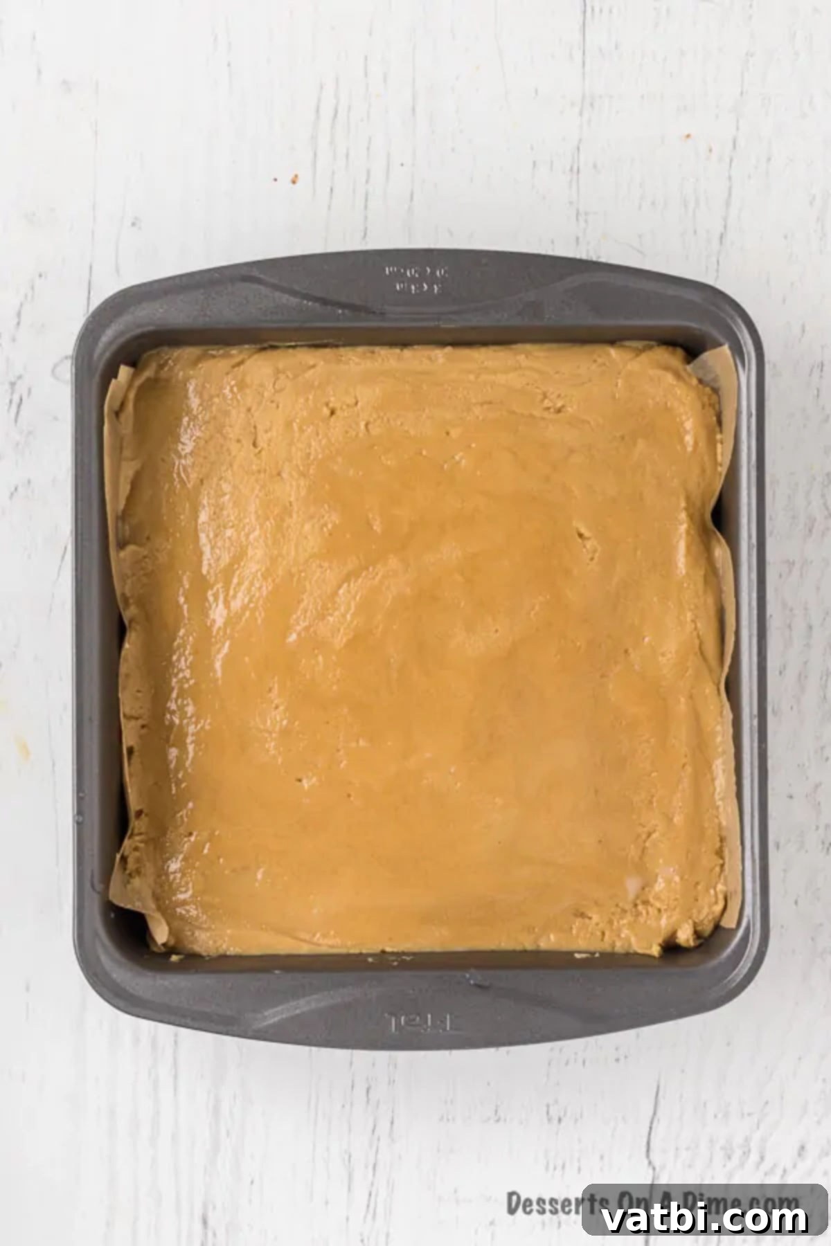 Easy 3-Ingredient Peanut Butter Fudge 9 Peanut butter fudge mixture spread evenly into the prepared baking dish.