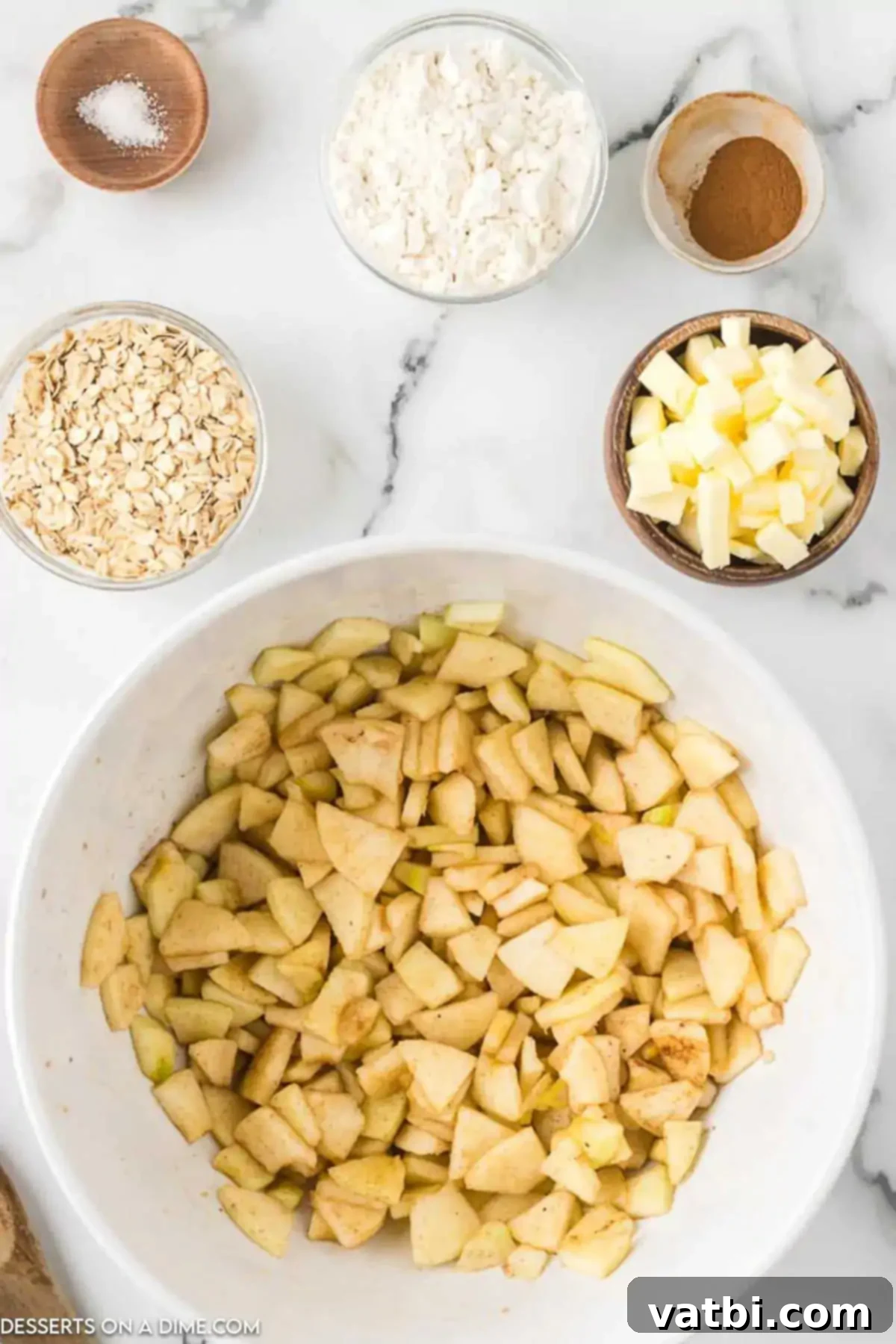 Classic Apple Crisp 4 Sliced apples in a bowl.