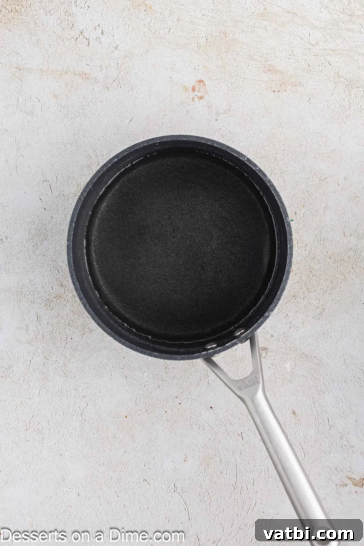 Heavenly Whipped Cream Delight 10 Saucepan with simply syrup mixture.