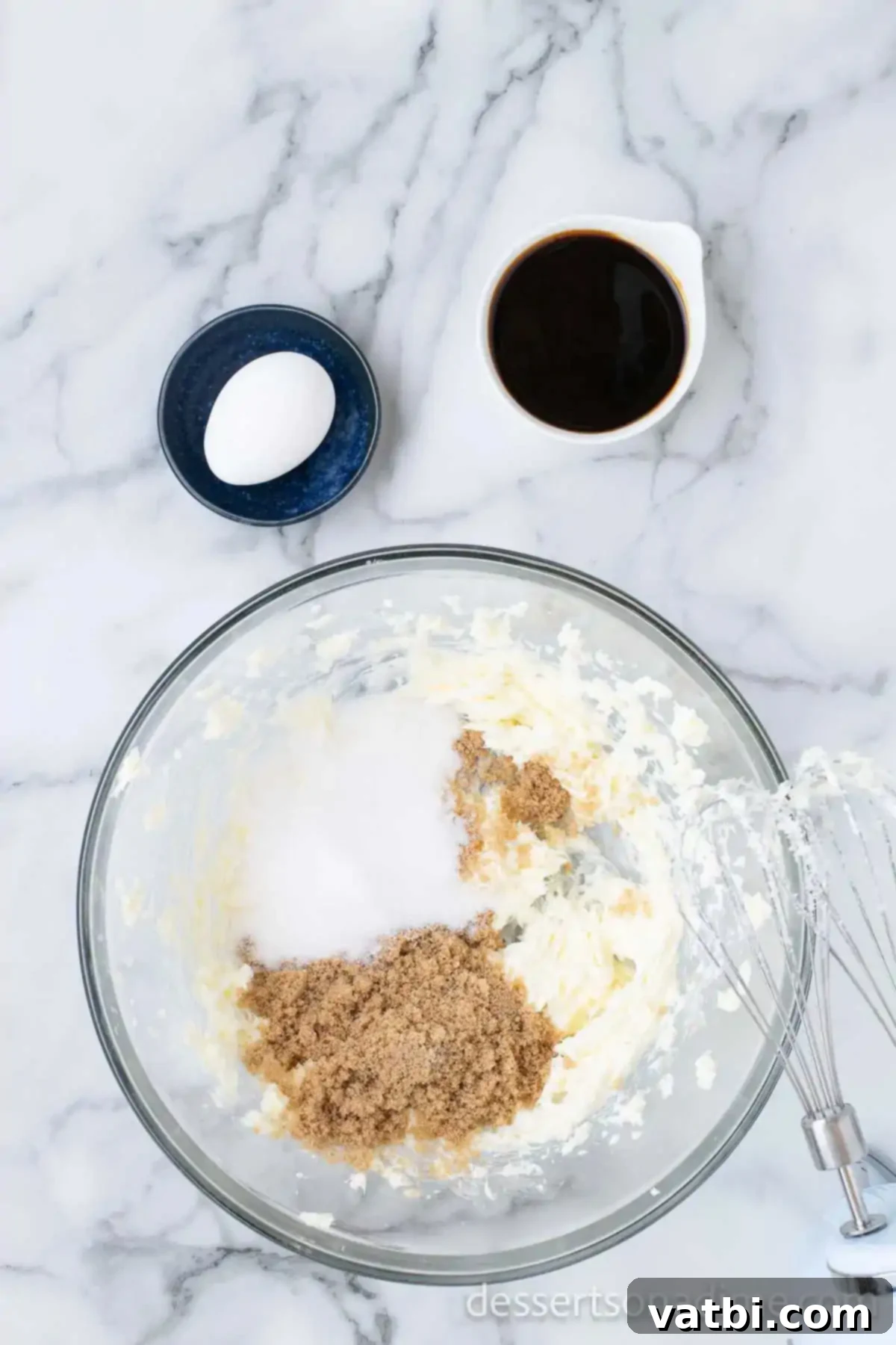 Chewy Ginger Molasses Cookies 5 Room temperature butter and brown sugar creamed together until light and fluffy in a stand mixer bowl.