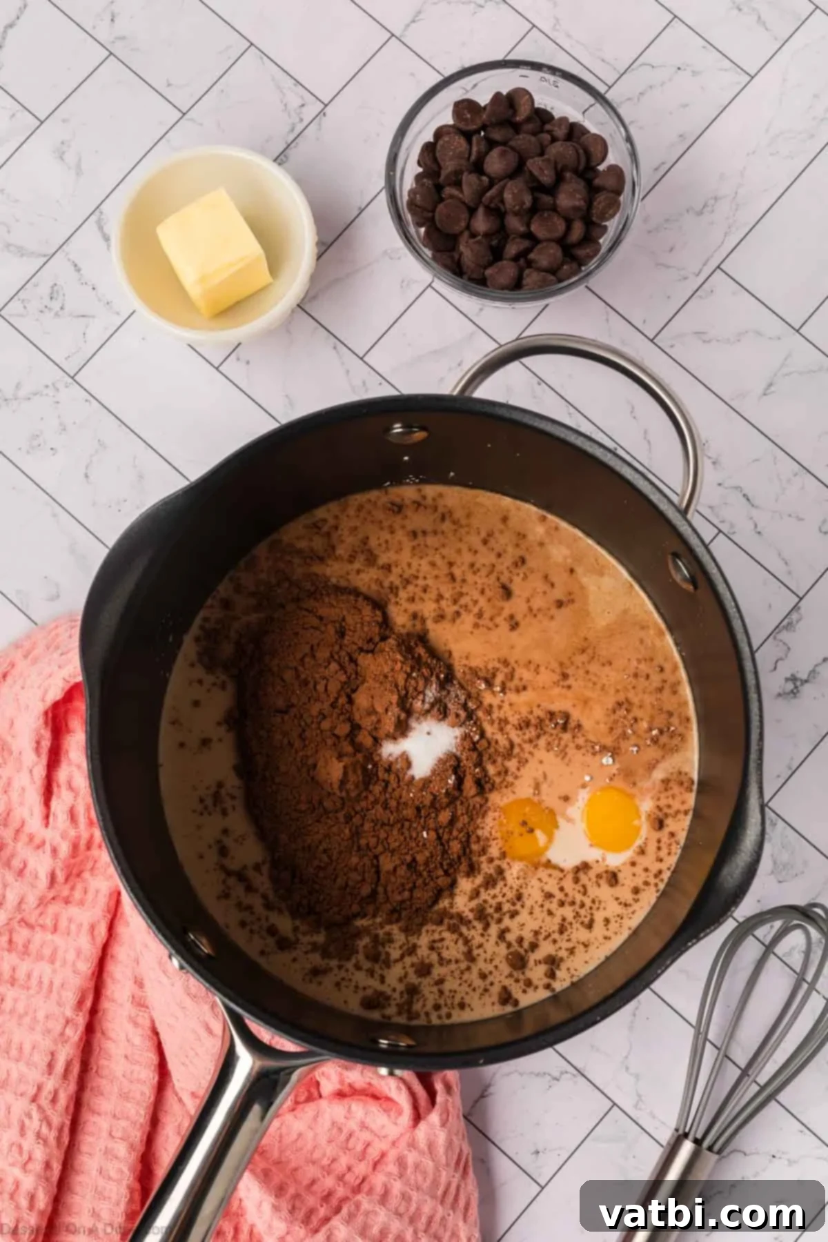 Deep Dark Chocolate Pudding 4 Ingredients combined in saucepan.