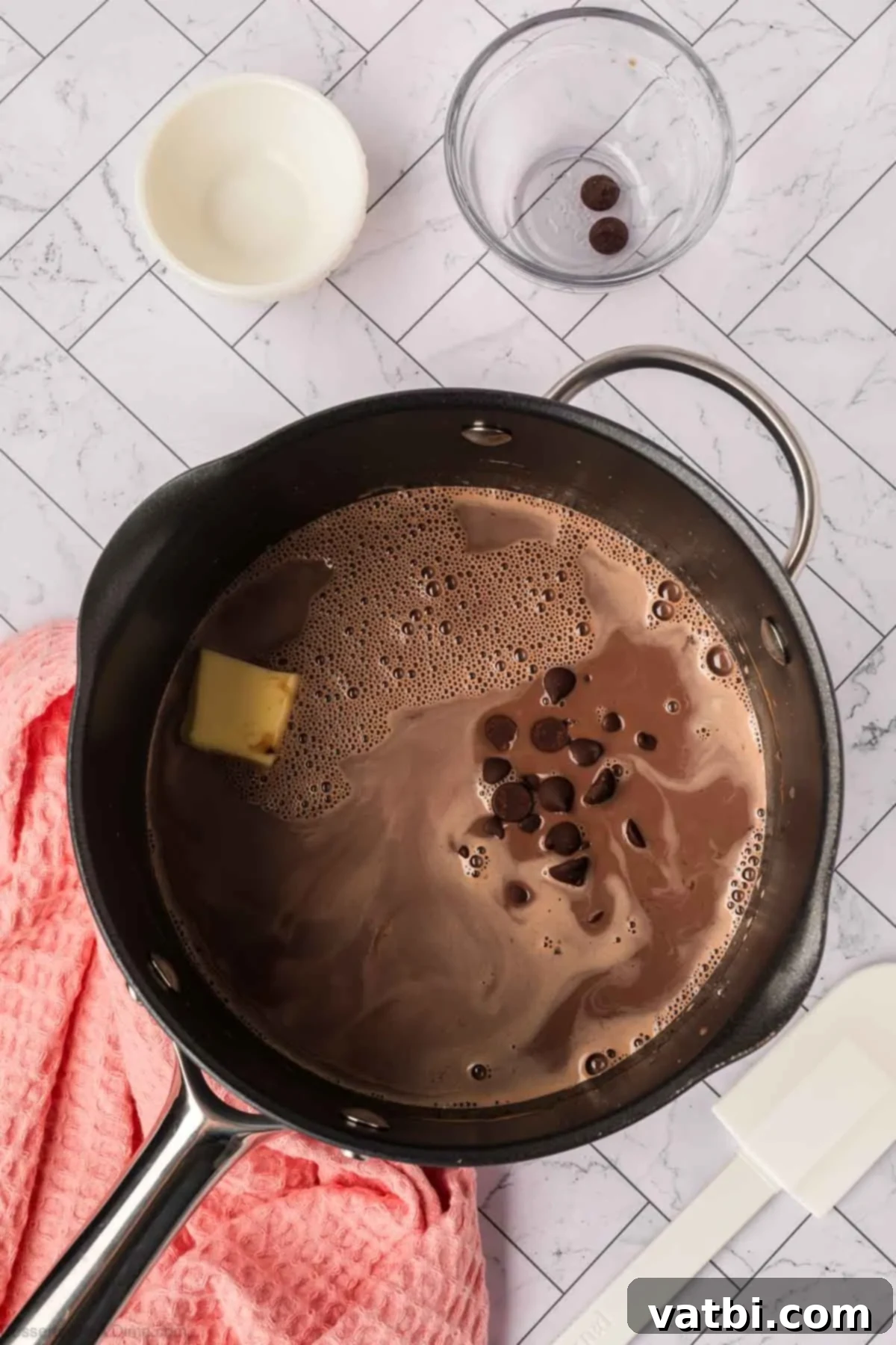 Deep Dark Chocolate Pudding 5 Butter and chocolate chips mixed into pan.