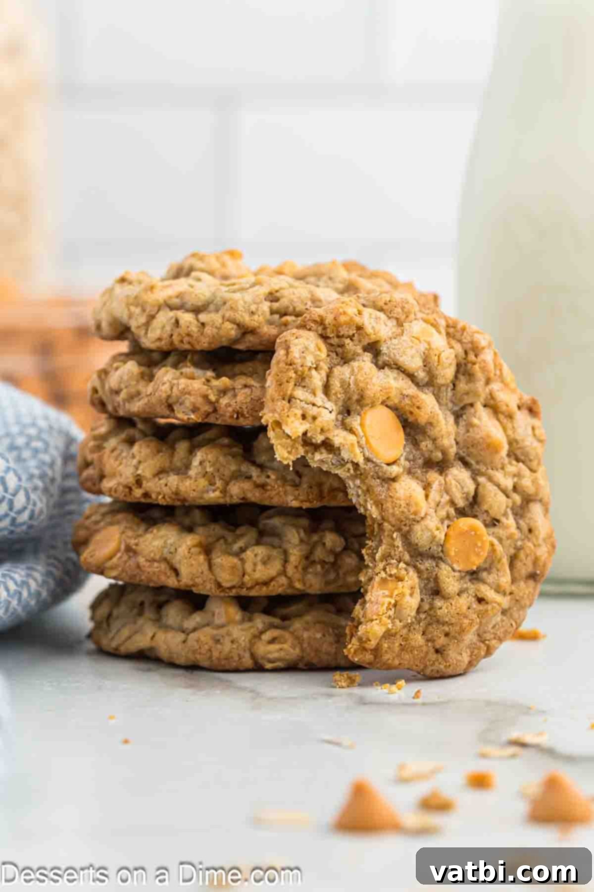 Oatmeal Butterscotch Cookies 9 A stack of golden brown Oatmeal Scotchies with visible butterscotch chips.