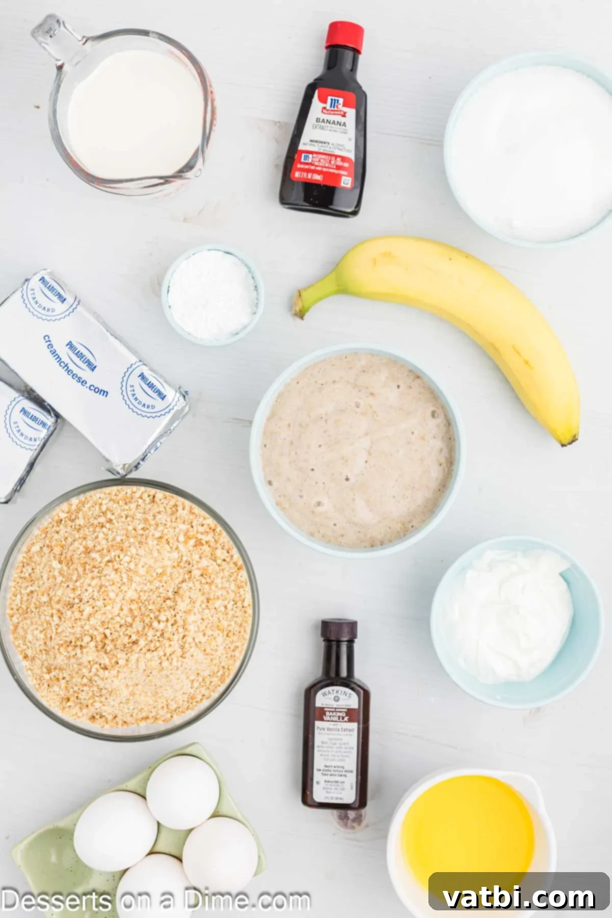 Decadent Banana Cheesecake 3 Ingredients for Banana Cream Cheesecake including Nilla wafers, sugar, butter, cream cheese, sour cream, vanilla extract, banana puree, eggs, and heavy whipping cream.