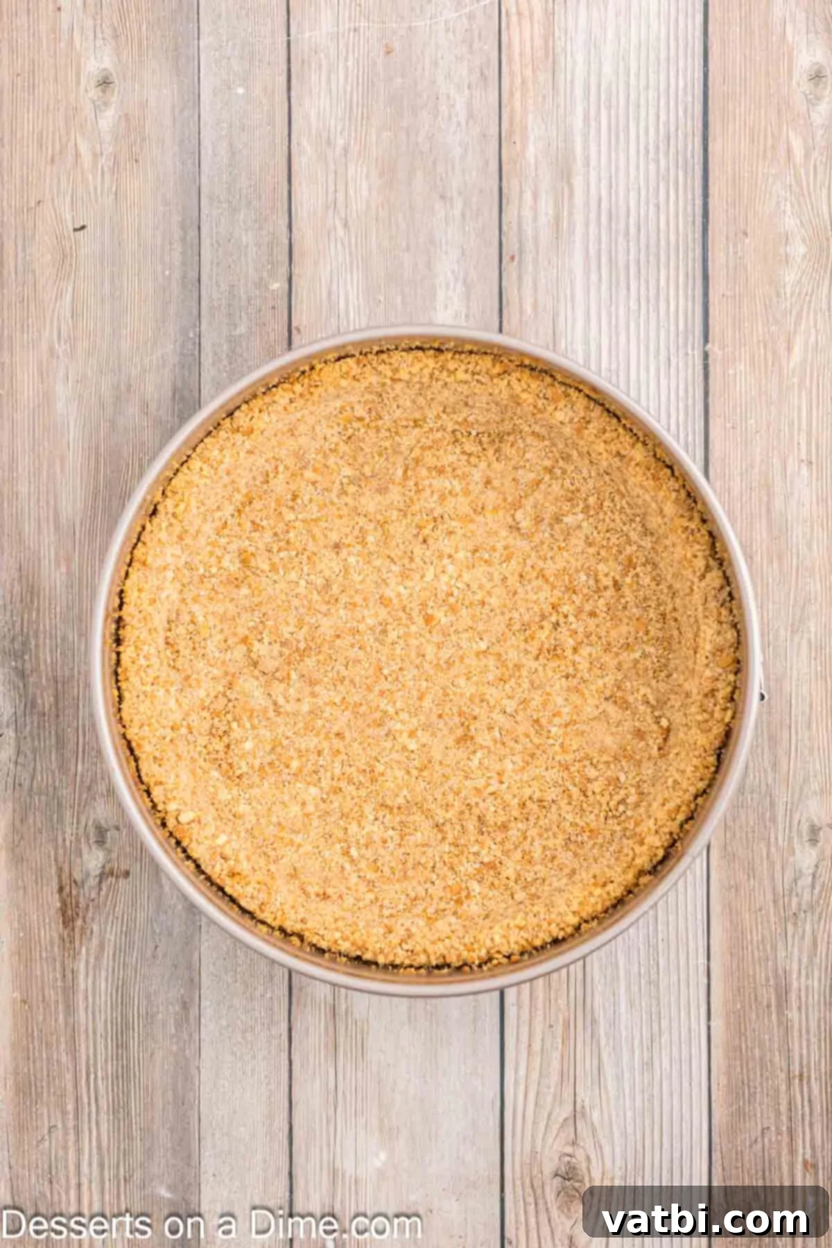 Decadent Banana Cheesecake 6 Nilla wafer crust mixture pressed into a springform pan and baked.