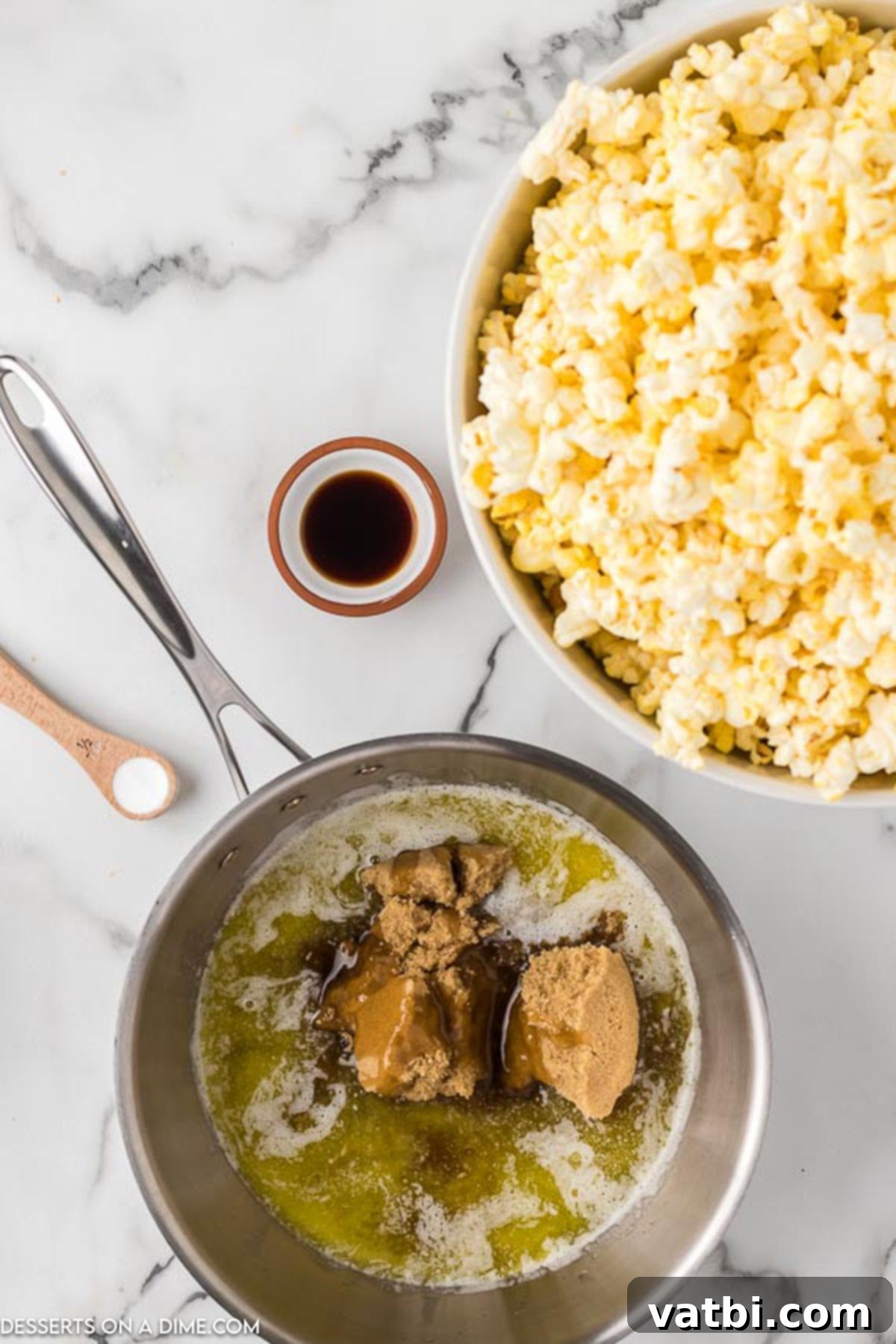 Ultimate Caramel Popcorn 4 Saucepan with brown sugar added to melted butter.