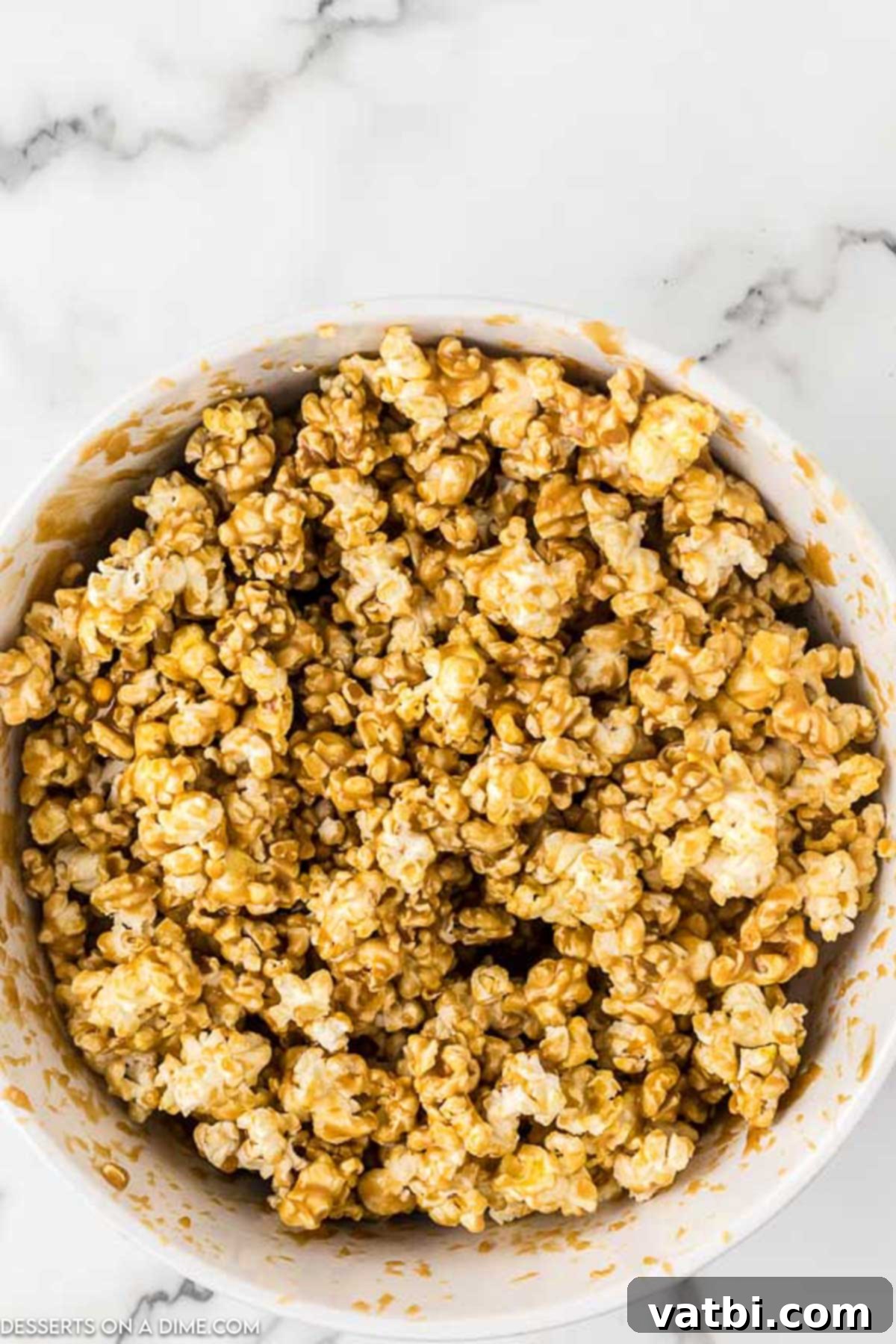 Ultimate Caramel Popcorn 6 Popcorn in bowl coated in caramel.