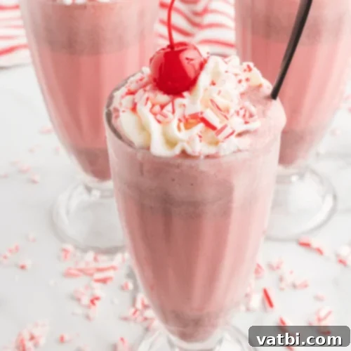 35 Simple Peppermint Delights 18 Peppermint milkshake with whipped cream and cherry.