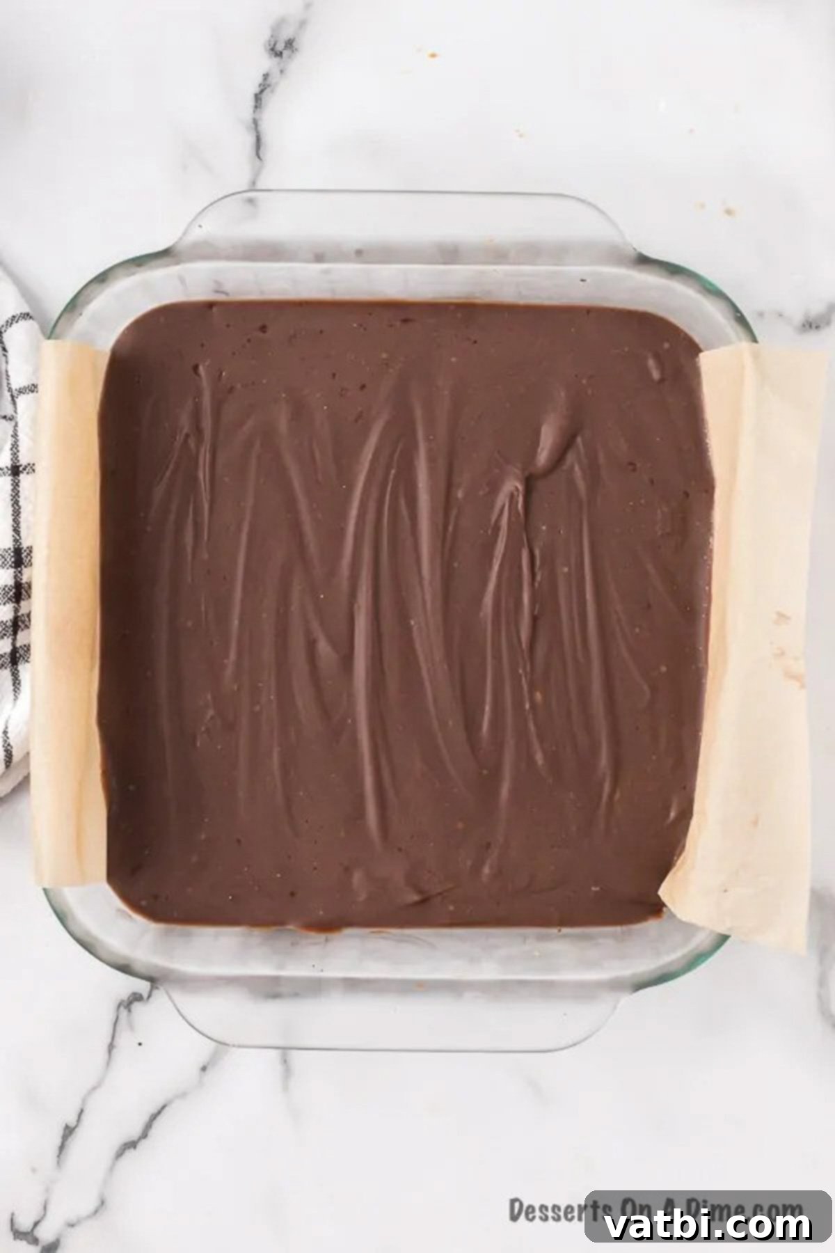 Rich and Creamy Chocolate Peanut Butter Fudge 7 Chocolate peanut butter fudge in pan hardened.