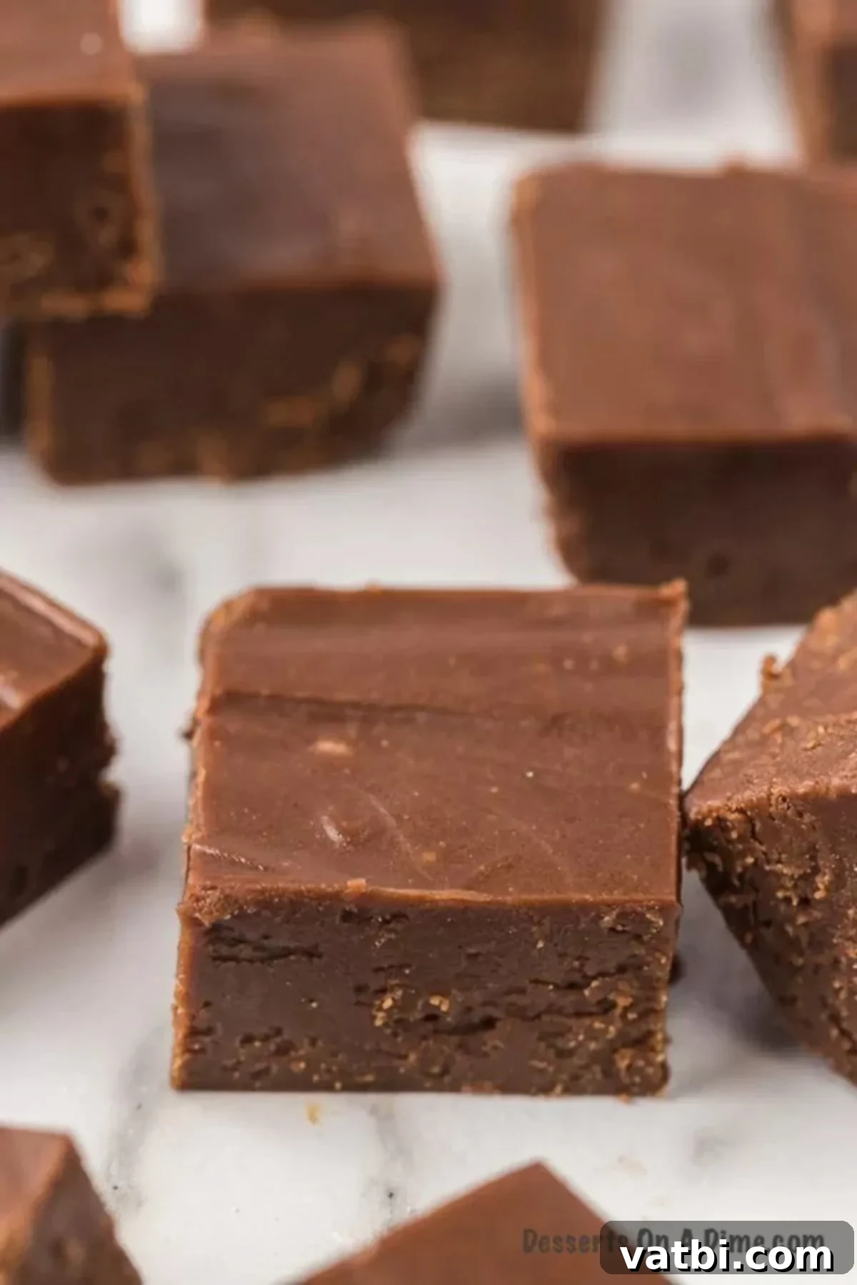 Rich and Creamy Chocolate Peanut Butter Fudge 8 Squares of chocolate peanut butter fudge.