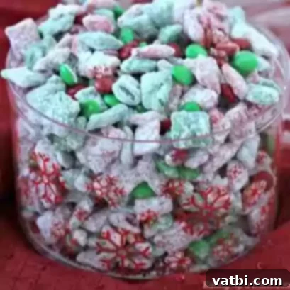 60 Festive and Simple Christmas Sweets 9 Festive Christmas Puppy Chow with red and green M&Ms.