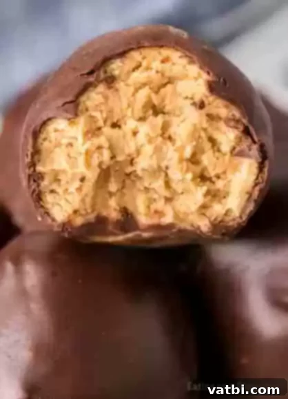 60 Festive and Simple Christmas Sweets 12 Chocolate-covered Peanut Butter Balls, resembling mini Reese's.