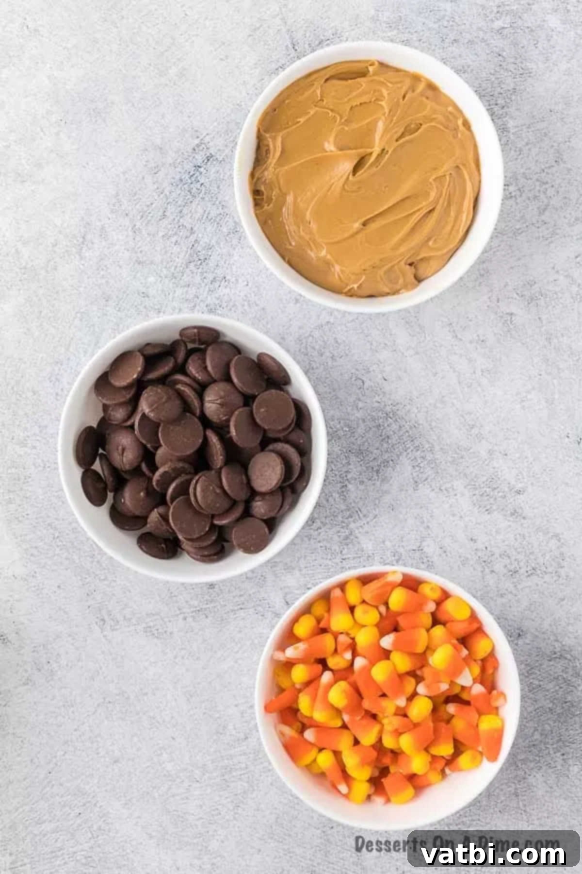 DIY Butterfinger Bars 3 Ingredients for homemade Butterfinger recipe: candy corn, creamy peanut butter, and chocolate candy melts.
