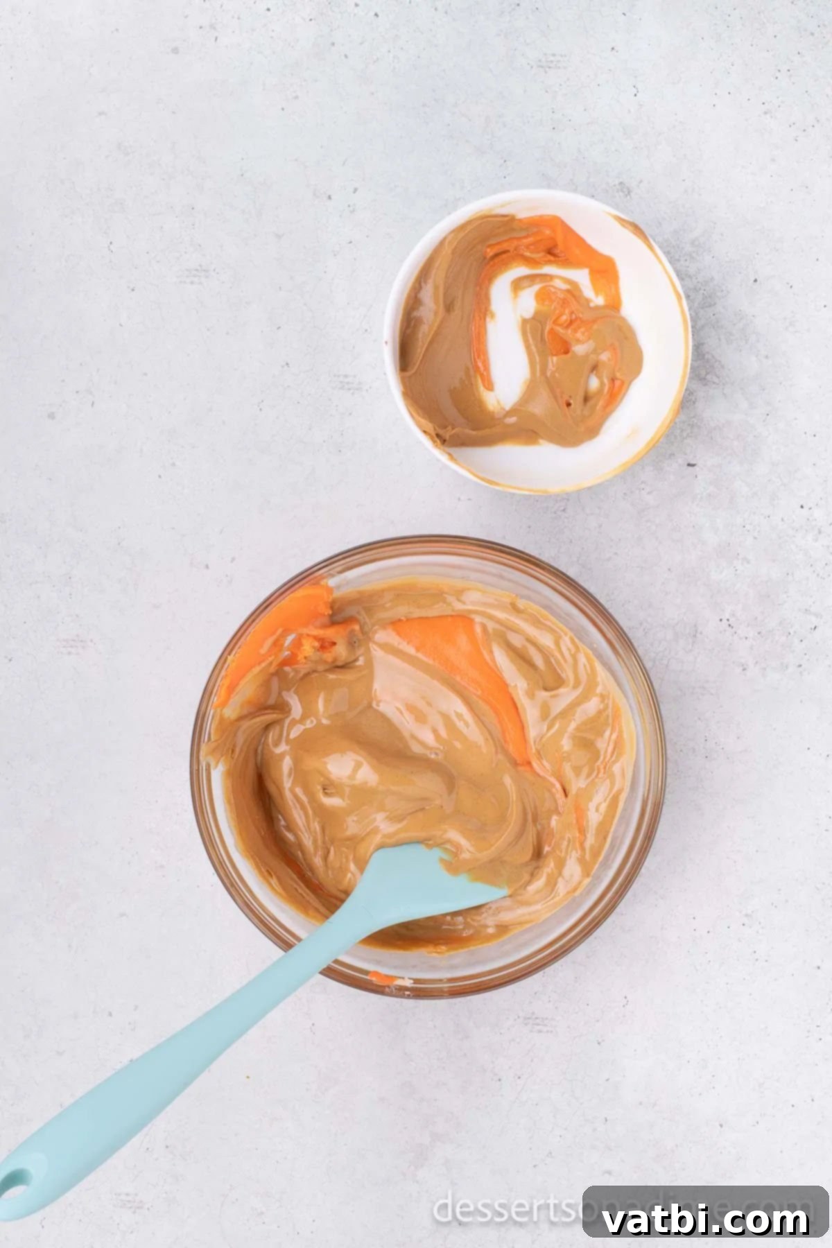DIY Butterfinger Bars 4 Bowl with melted candy corn and creamy peanut butter combined.