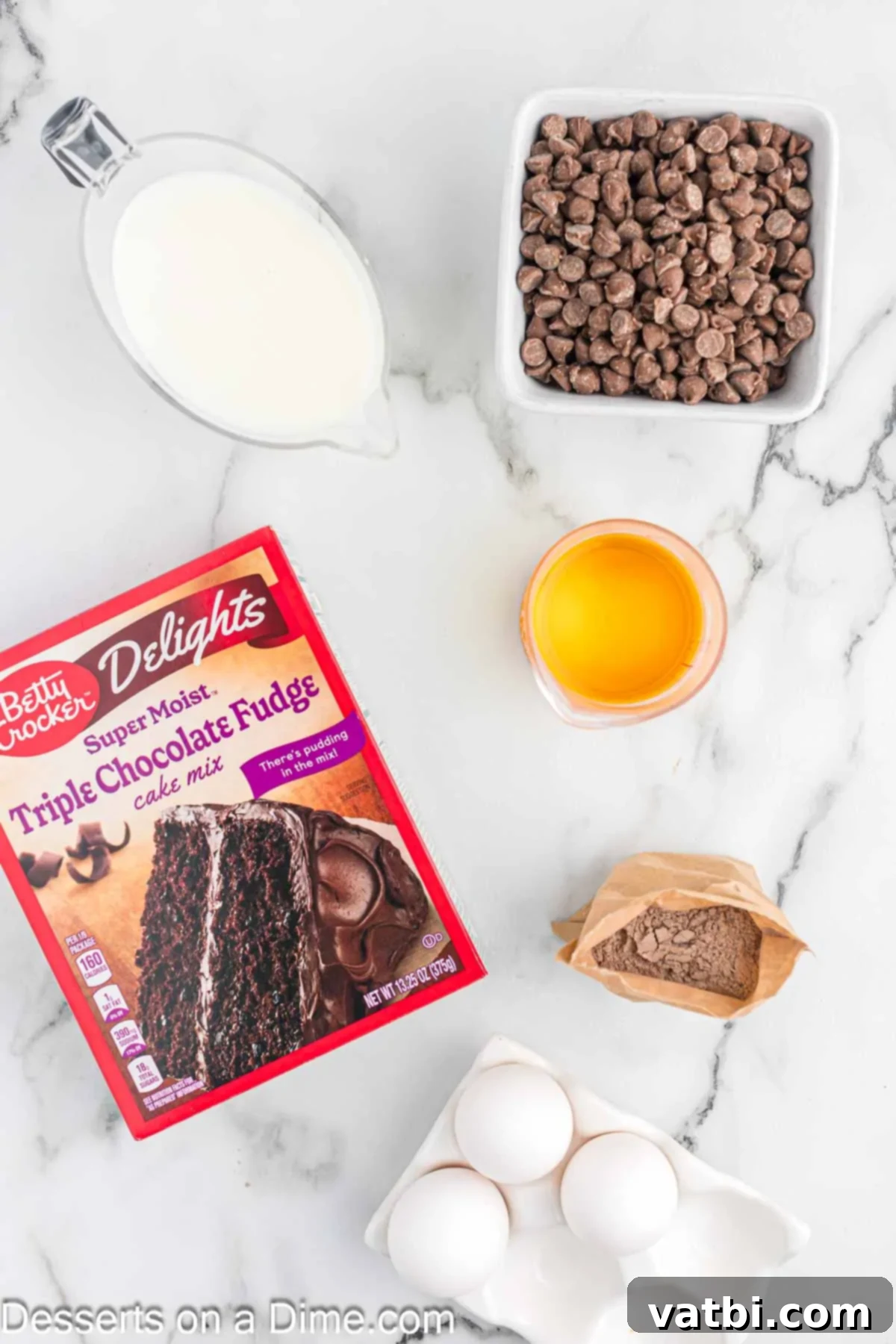 Crock-Pot Molten Chocolate Dream 3 Ingredients for lava cake laid out: cake mix, chocolate chips, oil, eggs, milk, pudding mix.