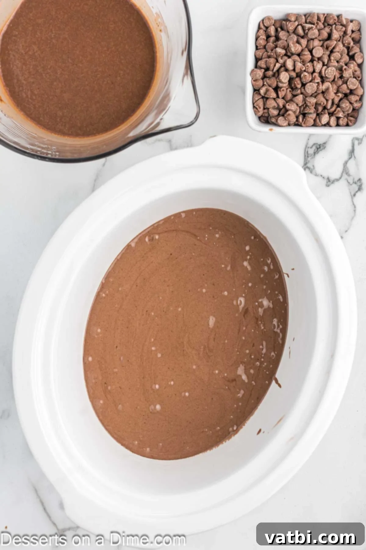 Crock-Pot Molten Chocolate Dream 5 Chocolate cake batter poured into a slow cooker.