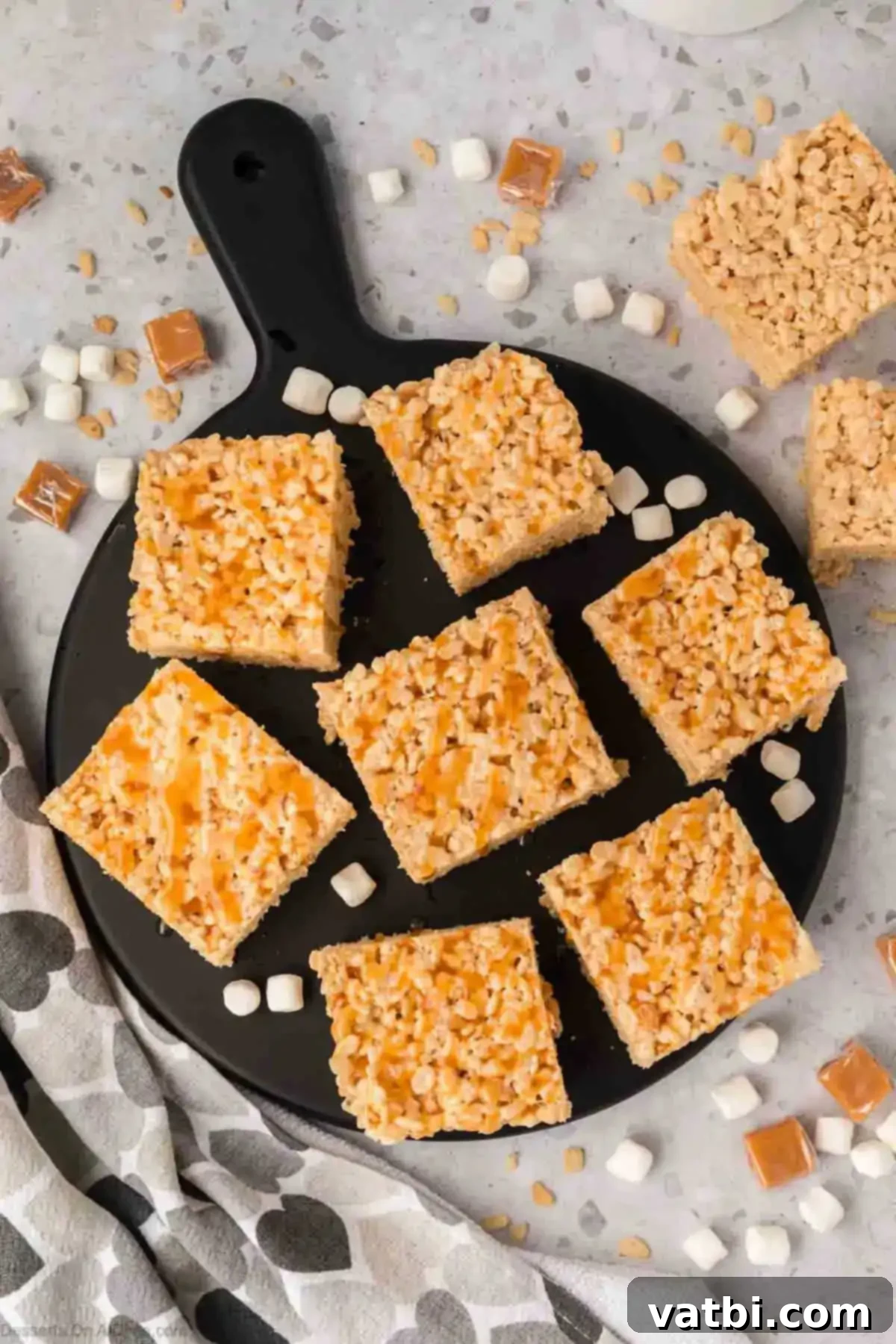 Irresistible Salted Caramel Rice Krispies 8 Serving platter with rice Krispie treats.