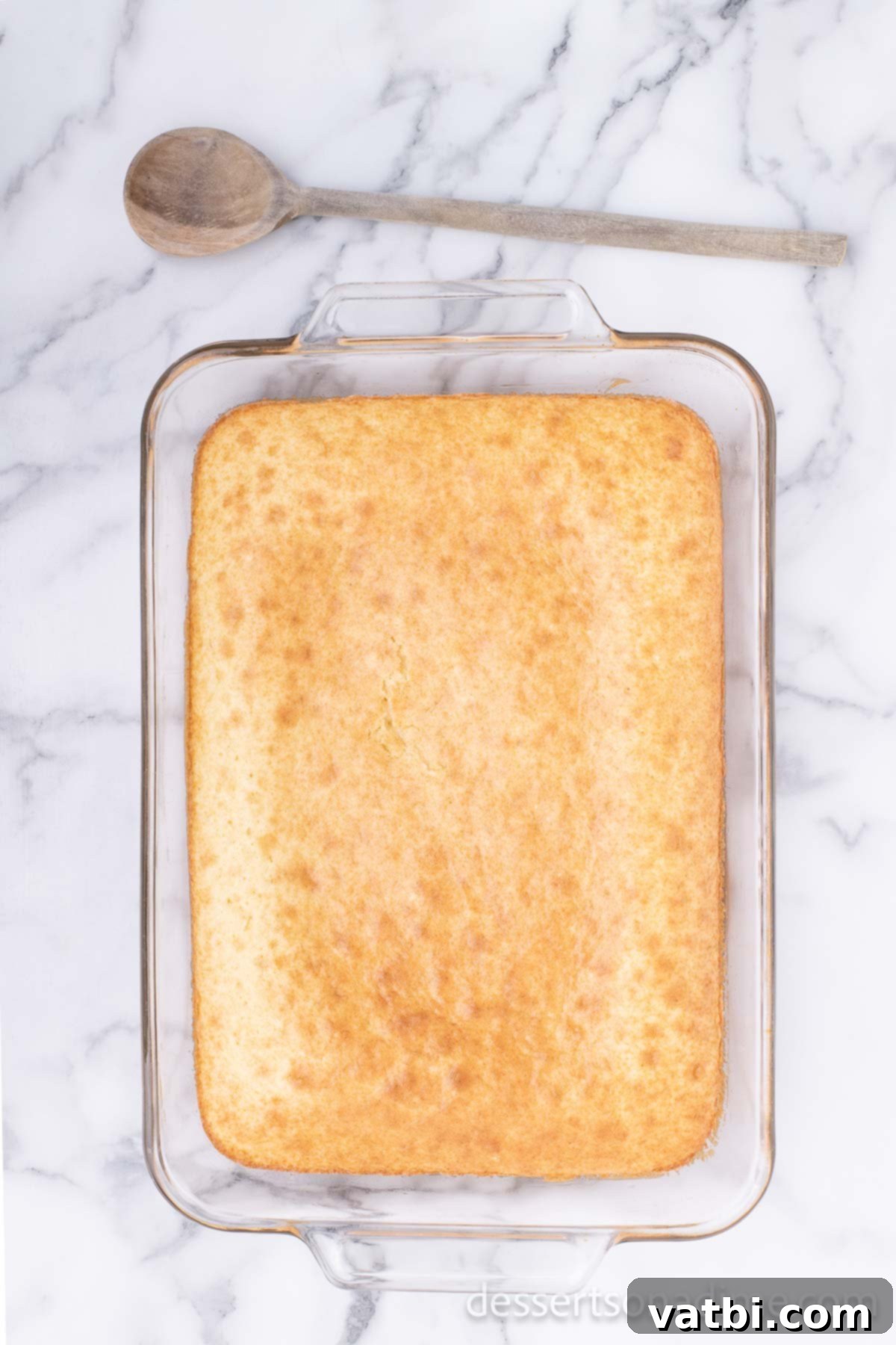 Cake baked in baking pan. 