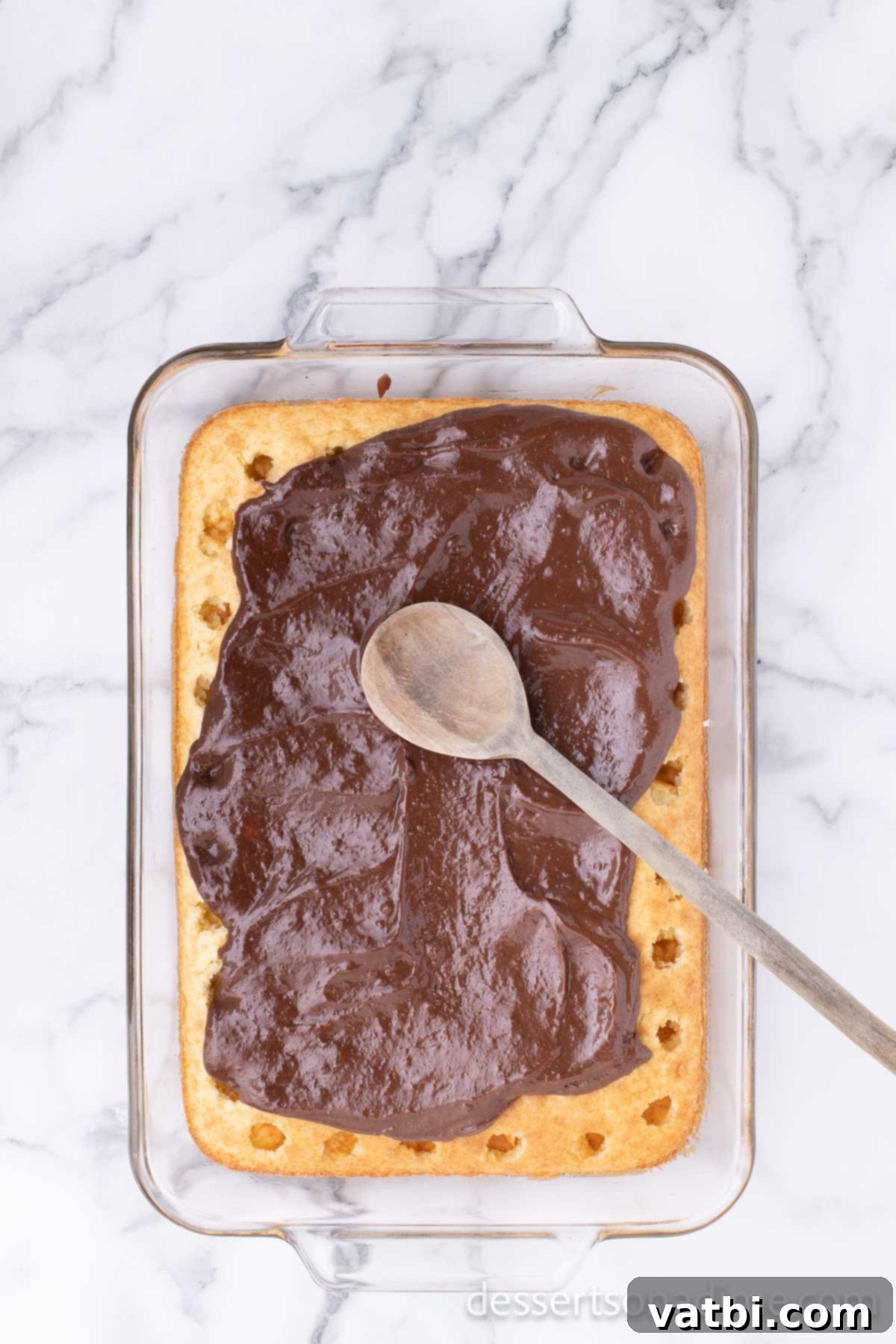 Chocolate spread on cake. 