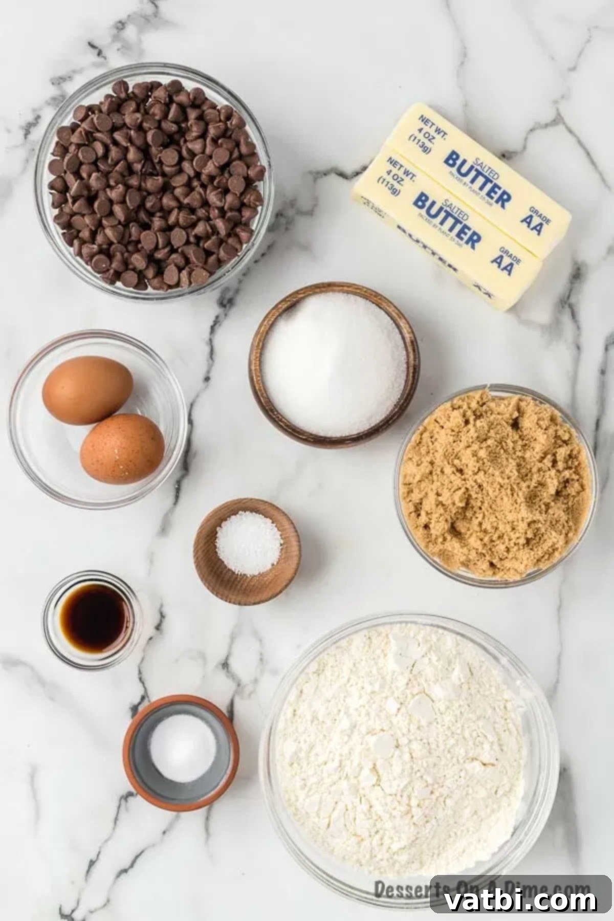 The Ultimate Crumbl Chocolate Chip Cookie Dupe 3 Ingredients for recipe: chocolate chips, butter, eggs, sugar, vanilla, flour.