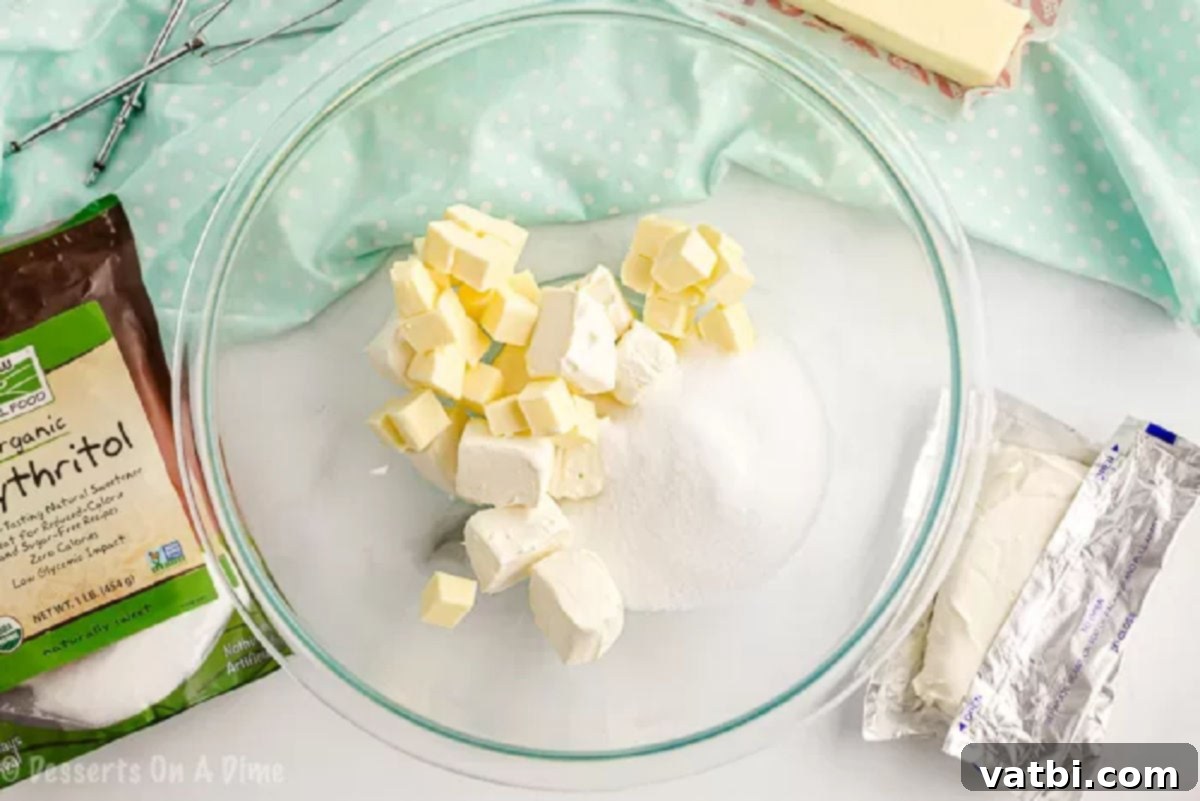Best Keto Cream Cheese Frosting Recipe 2 Butter and cream cheese in a bowl.