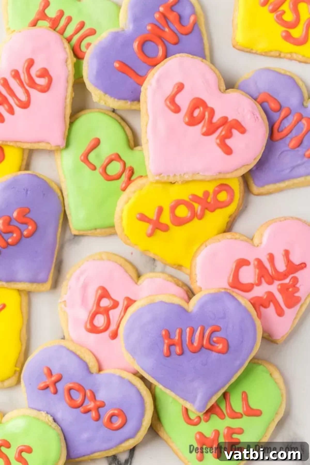 Sweetheart Sugar Cookie Delights 2 Valentine's day sugar cookies spread out.
