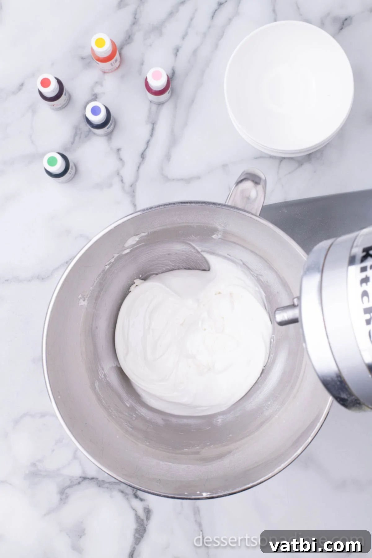 Sweetheart Sugar Cookie Delights 12 Mixing bowl with frosting ingredients combined.
