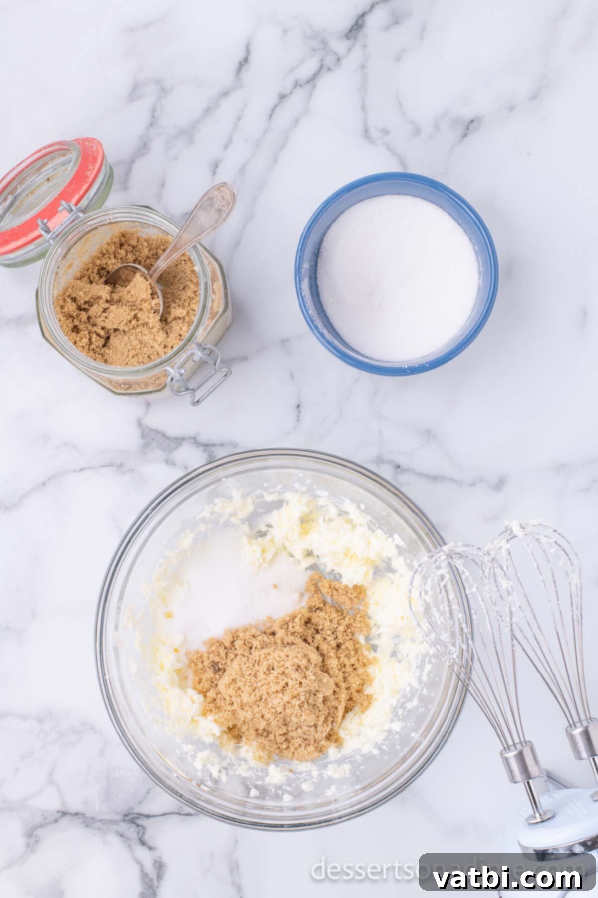 Perfect Homemade Chipwich Delight 4 Brown sugar and butter mixed together in a bowl, creating a creamy texture.