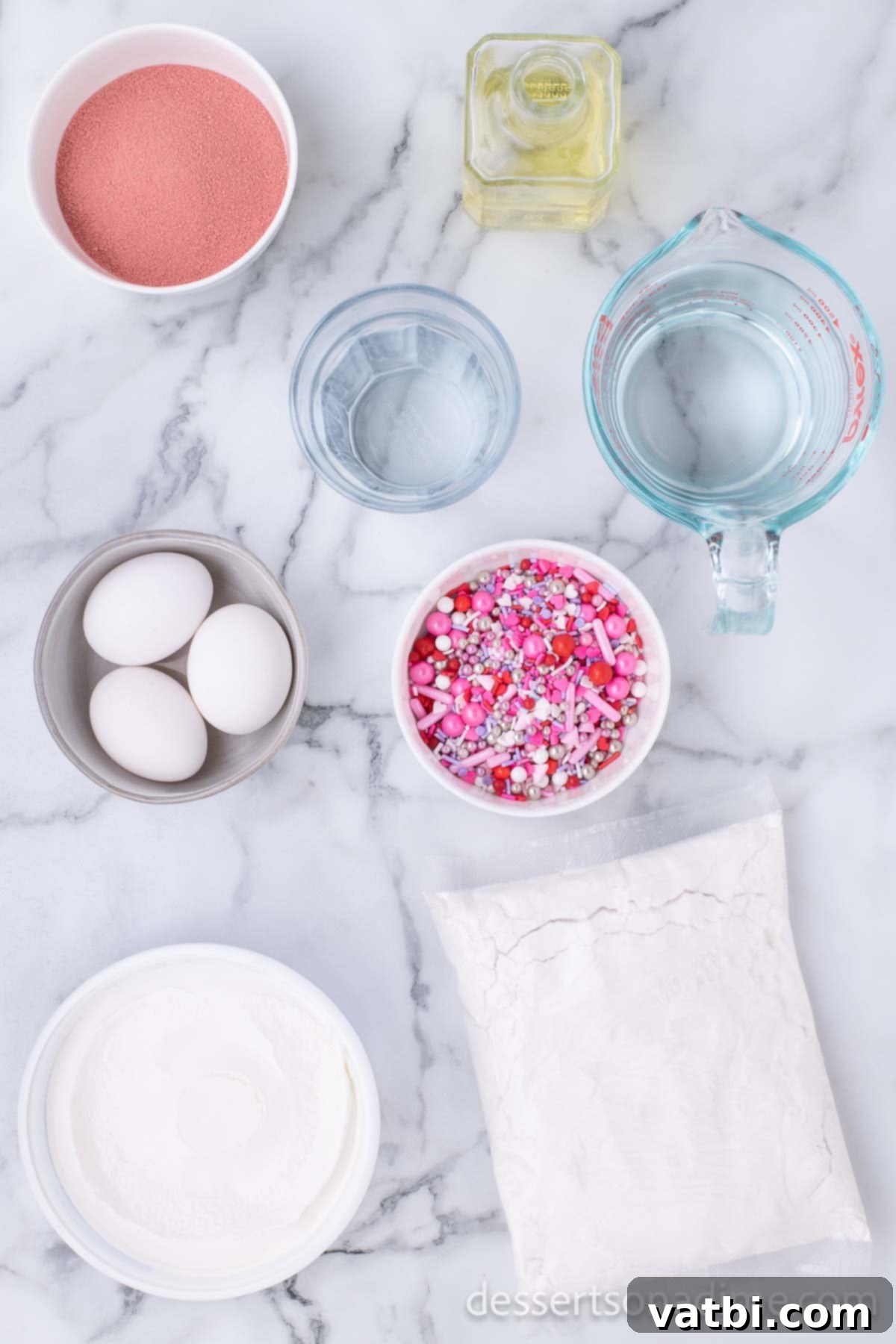 Sweet Valentine's Poke Cake 3 Ingredients for cake - white cake mix, strawberry jello, whipped topping, sprinkles.