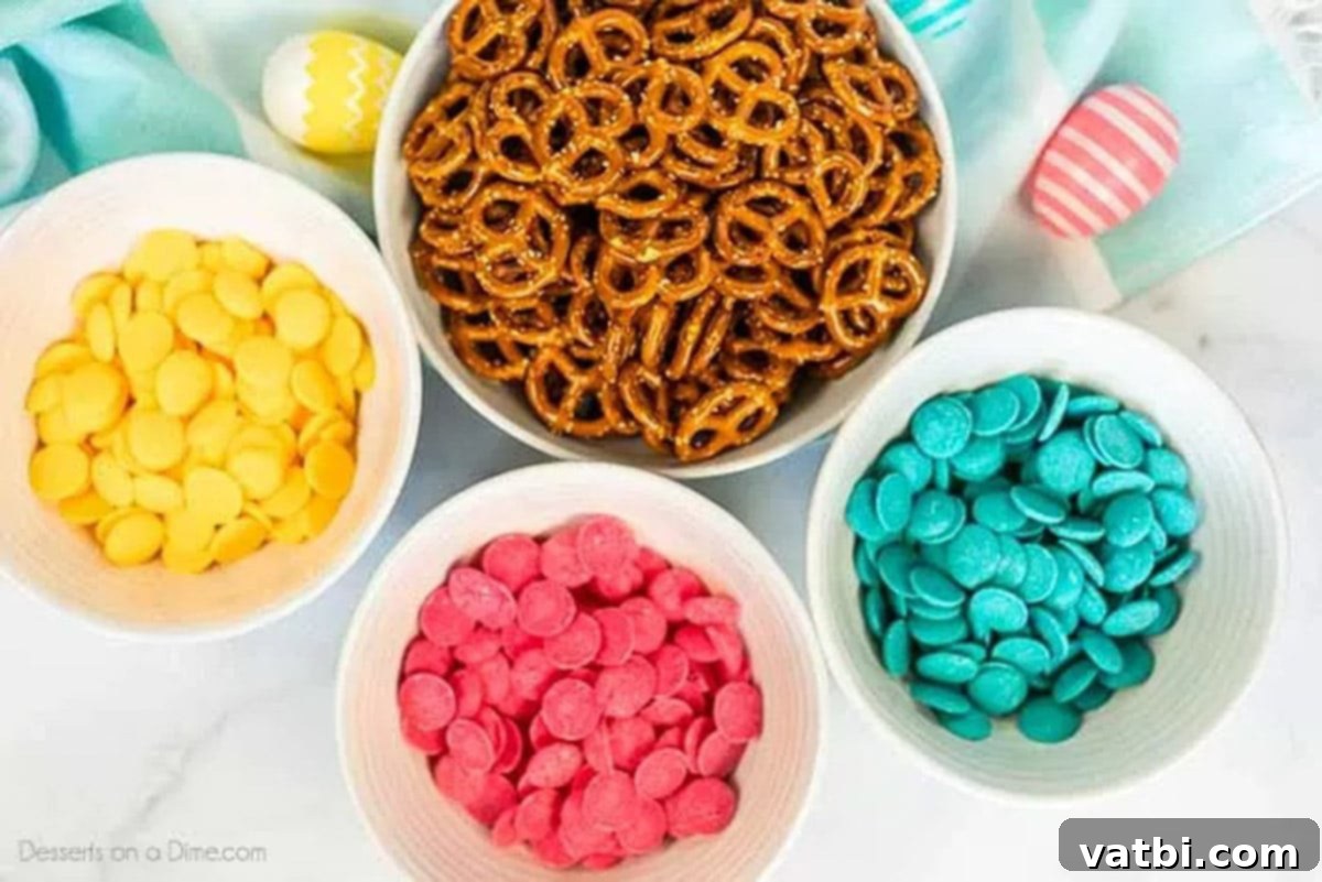 Ingredients for Easter chocolate covered pretzels: mini twists and pastel candy melts.