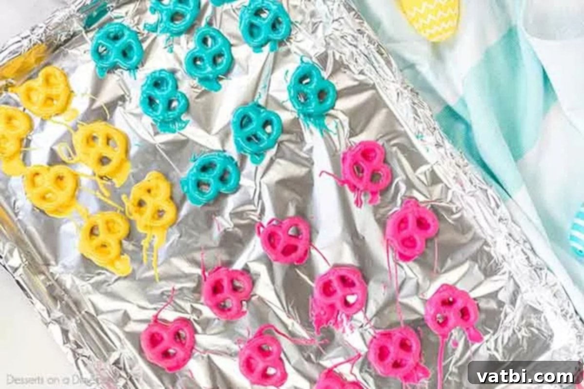 Easter Chocolate Covered Pretzels laid out on a baking sheet lined with parchment paper