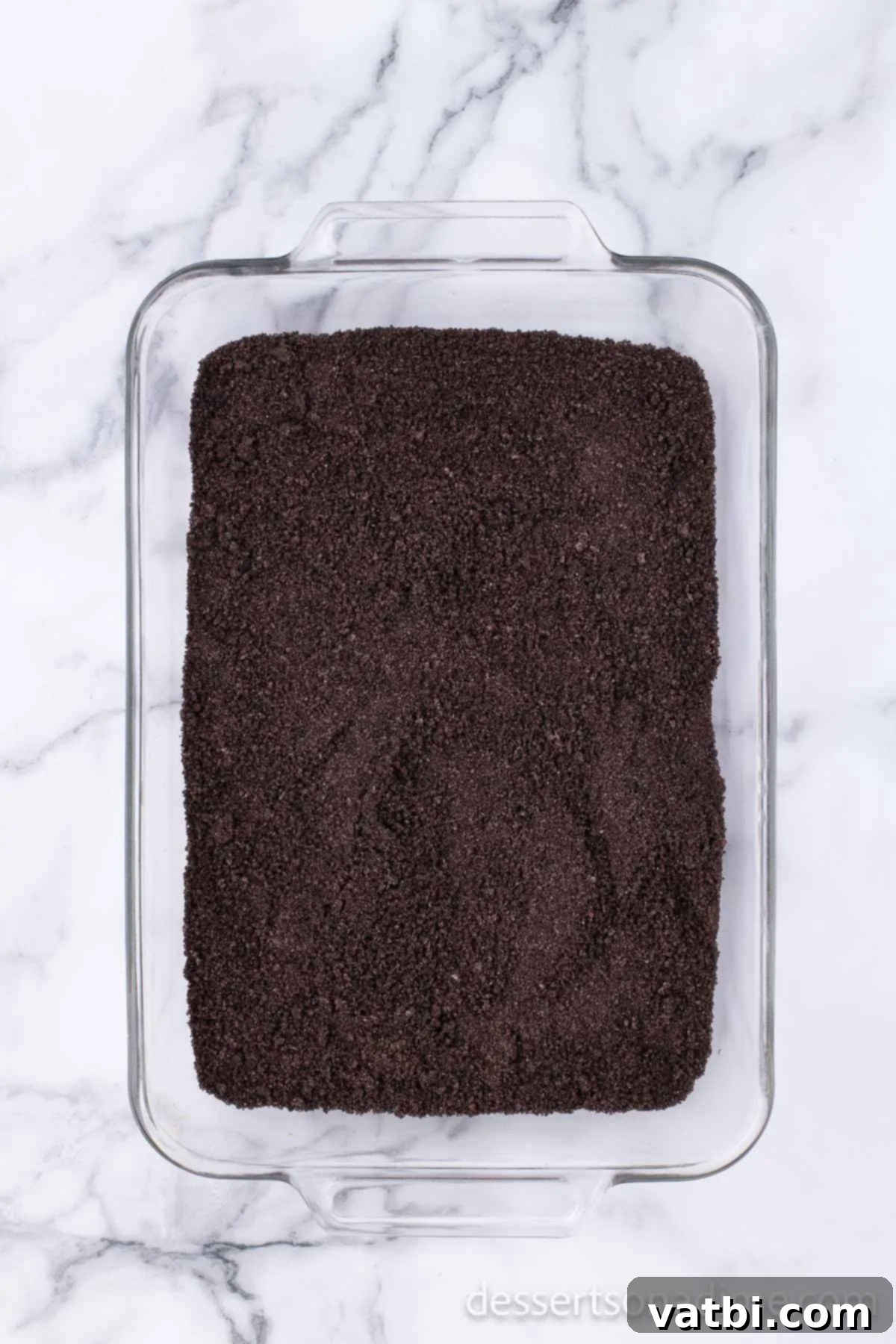 Simple Cream Cheese Free Dirt Cake 4 Cookie crumbs in pan.