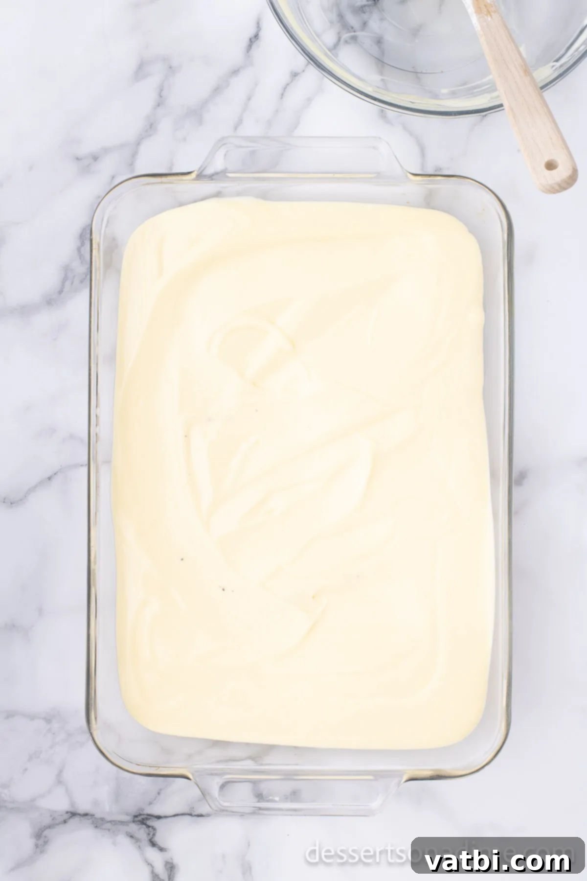 Simple Cream Cheese Free Dirt Cake 7 Pudding mixture spread in pan.