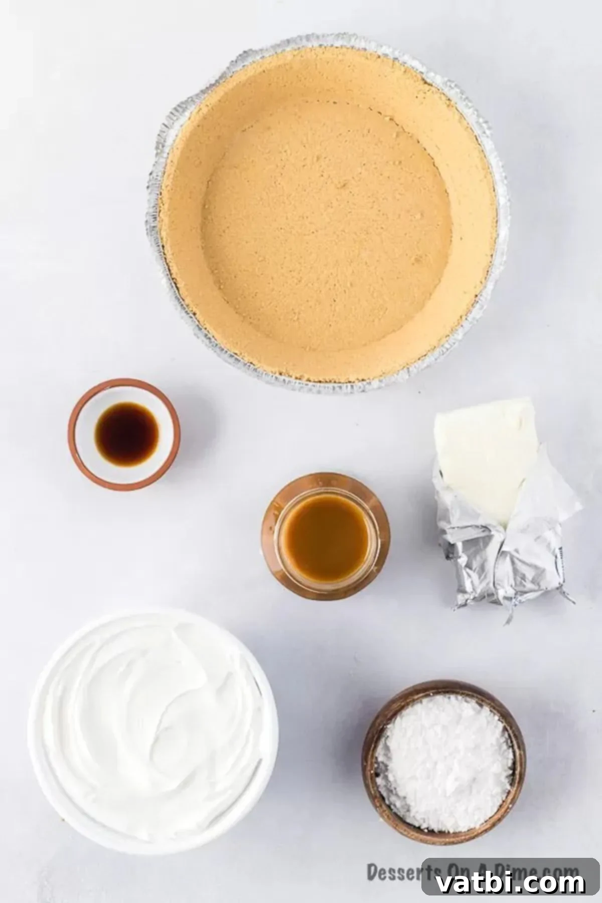 Irresistible Salted Caramel Pie 3 Ingredients for no-bake pie: graham cracker crust, cream cheese, powdered sugar, salted caramel sauce, and whipped topping.