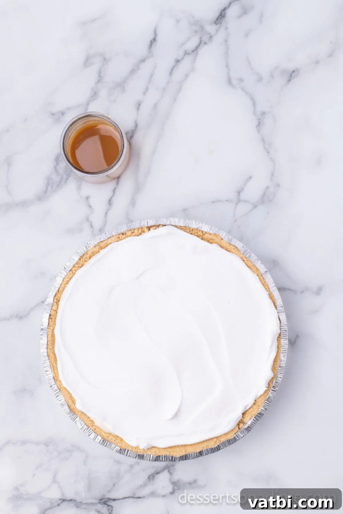 Irresistible Salted Caramel Pie 8 Remaining whipped topping spread on top of the chilled pie.