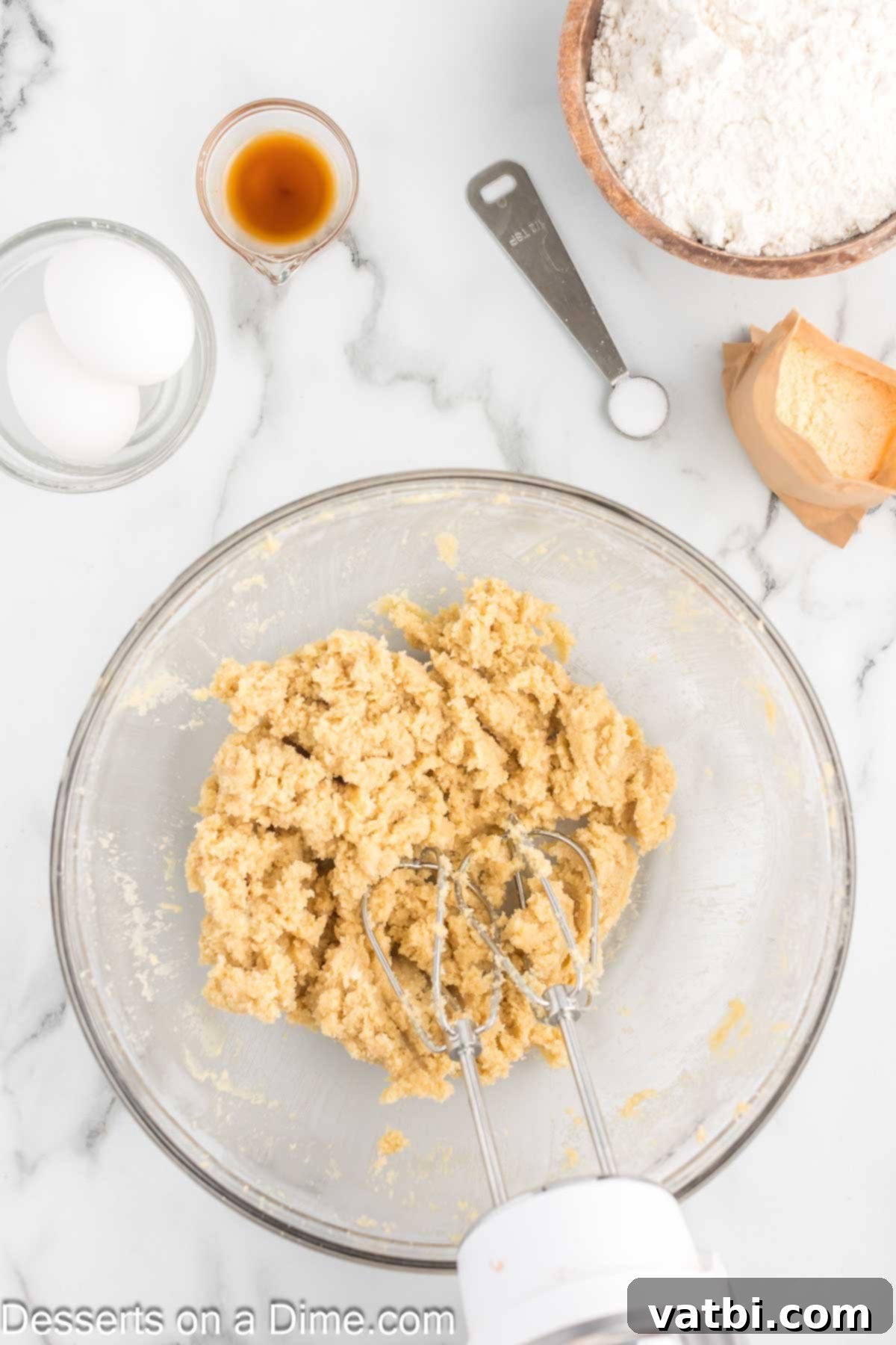 Irresistibly Soft Chocolate Chip Pudding Cookies 4 Large mixing bowl with softened butter, light brown sugar, and granulated sugar ready to be creamed.